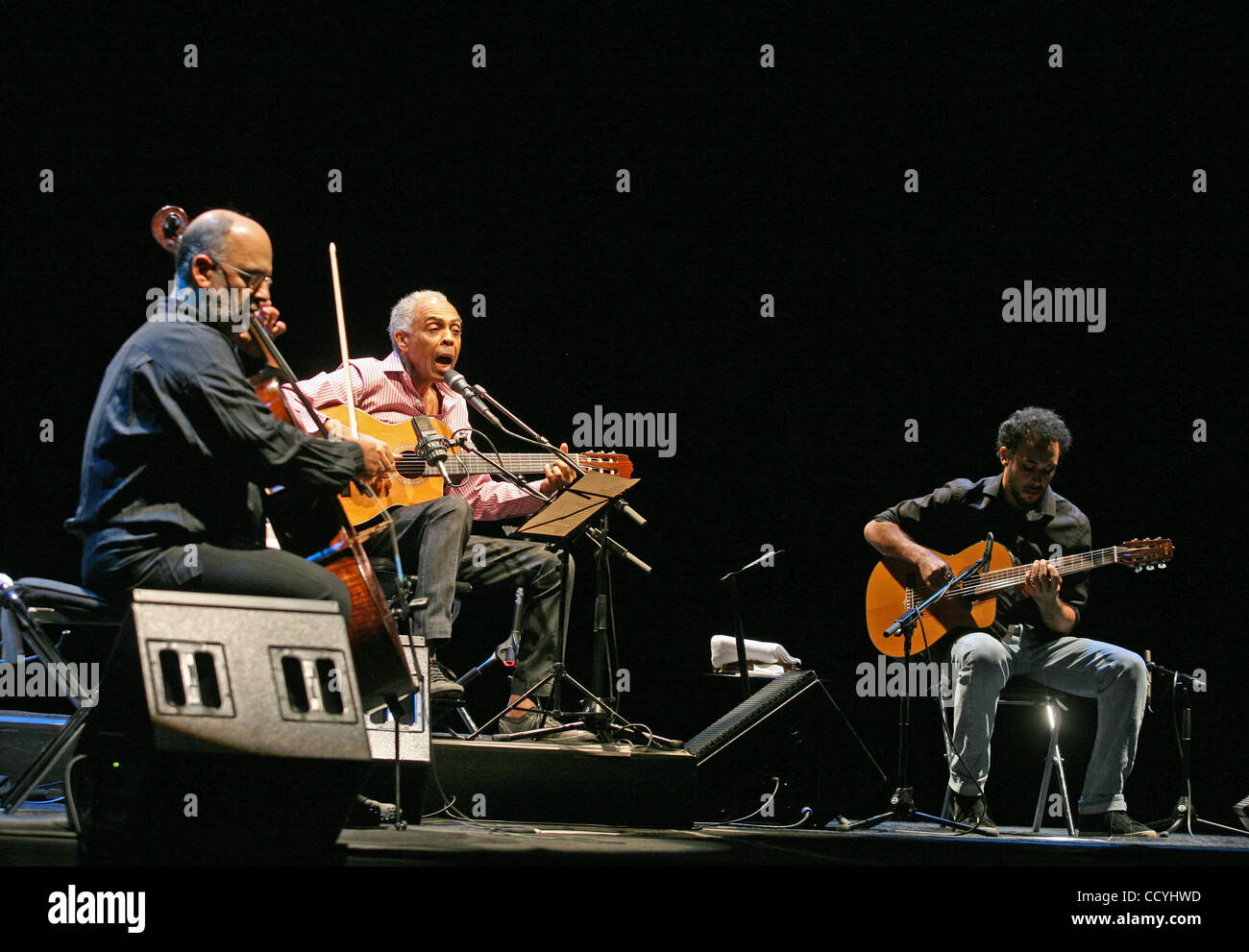 Brazilian singer and former Minister of Culture Gilberto Gil (center) performs with Jaques Morelenbaum (L) and Bem Gil (R) on stage during the String Concert at UCLA Royce Hall in Los Angeles. (Photo by Ringo Chiu / Zuma Press) Stock Photo
