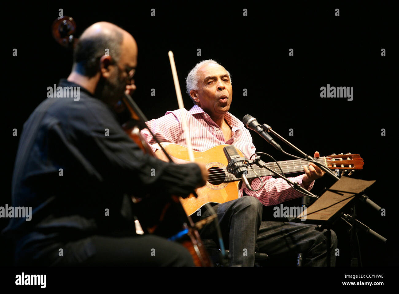 Brazilian singer and former Minister of Culture Gilberto Gil (R) performs with Jaques Morelenbaum on stage during the String Concert at UCLA Royce Hall in Los Angeles. (Photo by Ringo Chiu / Zuma Press) Stock Photo