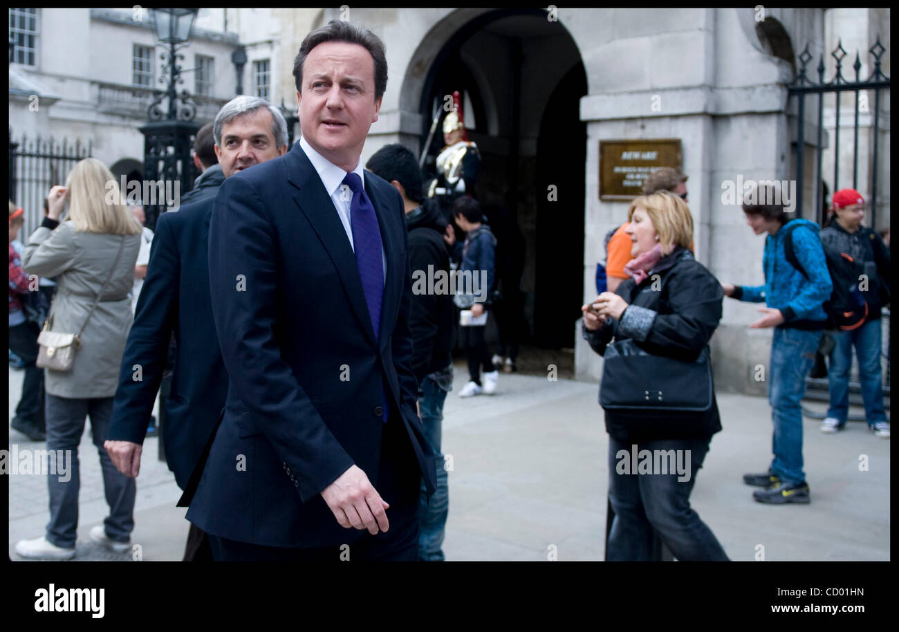 May 14, 2010 - London, UK - British Prime Minister David Cameron with Chris Huhne, the Secretary of State for Energy and Climate Change walking down Whitehall on their way to visit  DECC on May 14, 2010. Photo By Andrew Parsons (Credit Image: © Andrew Parsons/ZUMApress.com) Stock Photo