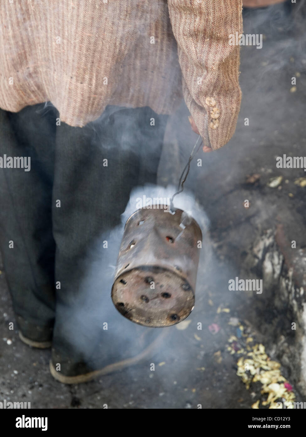 Apr 05, 2008 Antigua, Sacatepez, Guatemala Worshippers swinging incense burning in cans