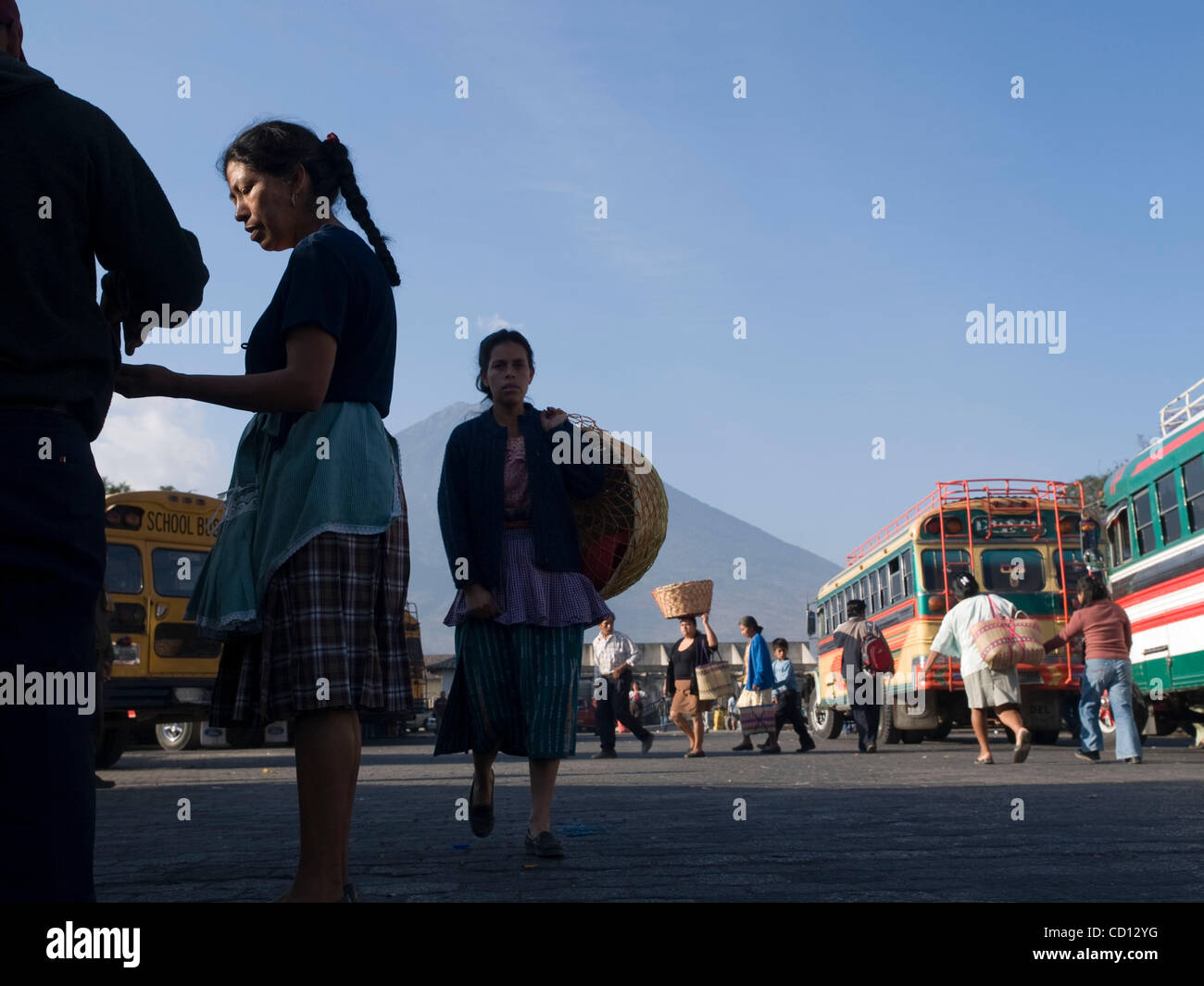 Woman in bus station in Antigua, Guatemala Stock Photo