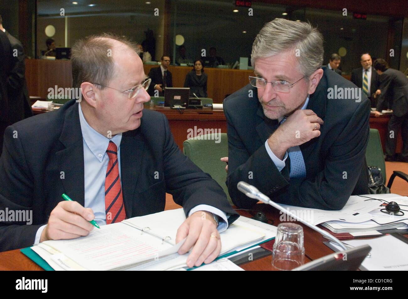 Nov 04, 2008 - Brussels, Belgium - German Finance Minister PEER STEINBRUECK (L) chats Head of the conservative Austrian People's Party prerior an European Union ECOFIN (Economic and Financial Affairs Council) meeting of finance minisers at European Coulcil headquarter In Brussels. Finance ministers  Stock Photo