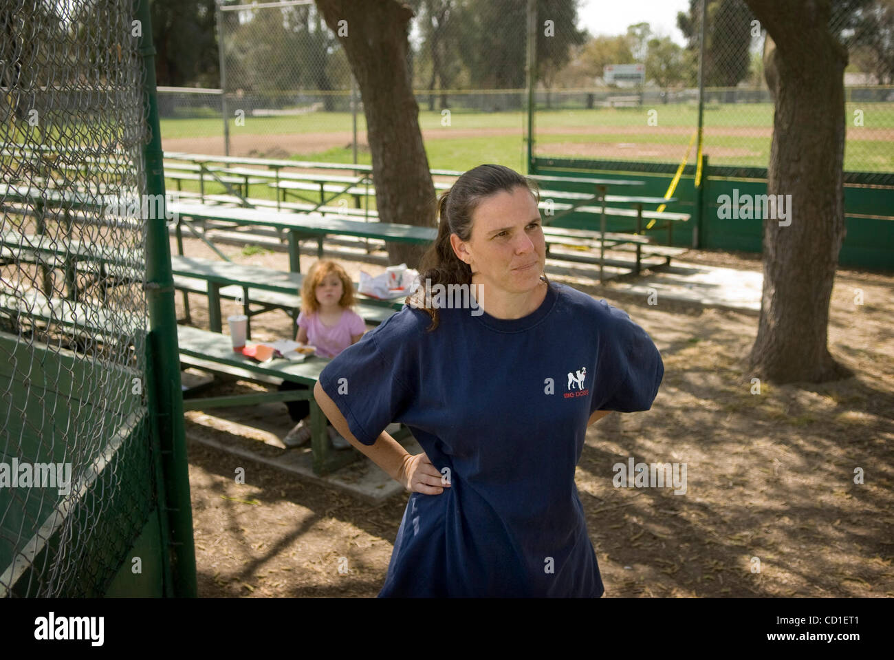 Michelle Kile, a board member for Parkway Little League talks about the little league snack shop that was burned by arsonists Sunday.  Her 6-year-old daughter, Allison Kile, 6, plays on a softball team with the league. The Porta-potties were burned, as was their equipment room which held the chidren Stock Photo