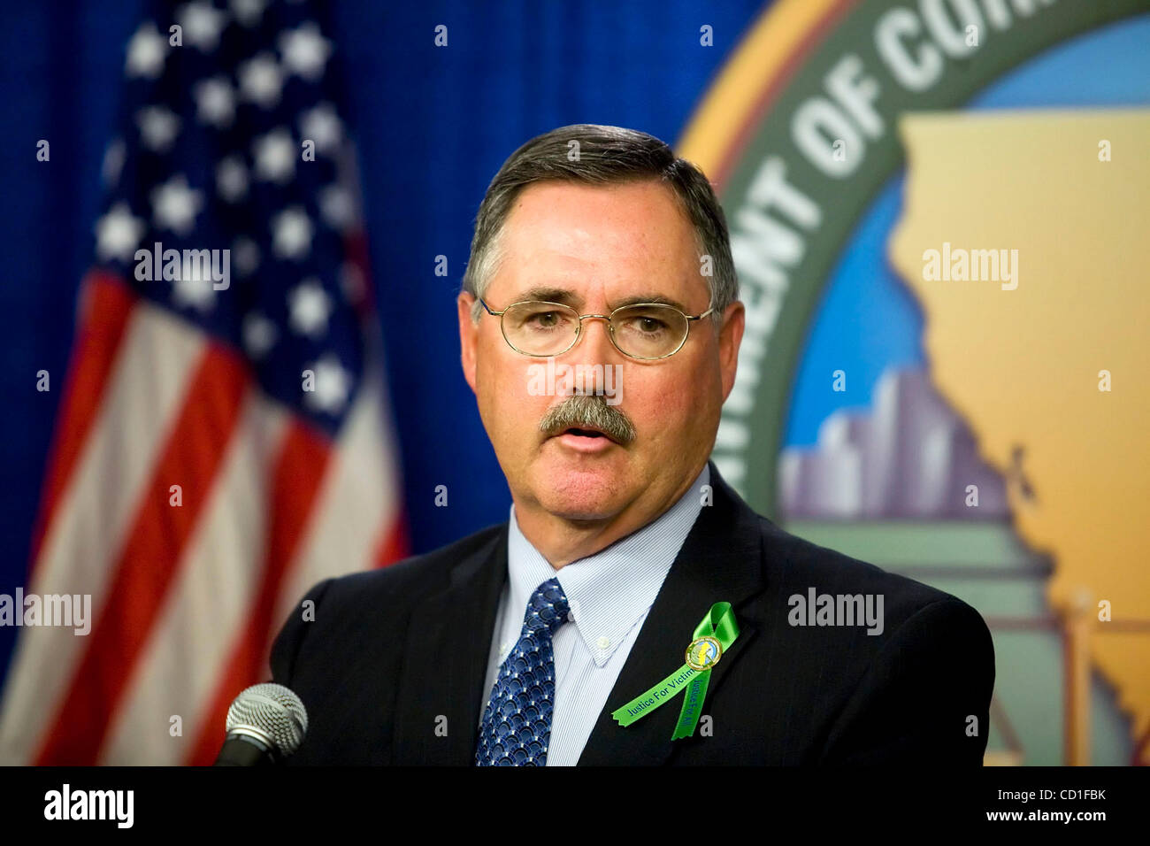 Secretary James Tilton, speaks after announcing his retirement as