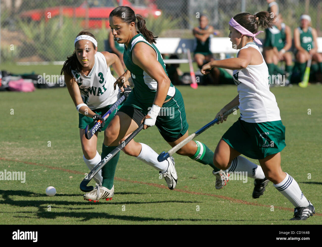 October 7, 2008, Poway, CA, USA Helix High School's field hockey team's victory at Poway High School, Helix High's star player TAYLOR WRIGHT moves the ball between Poway players DANNI BUDDE (cq), left, and DALENNA KESSLER, at right Credit: photo by Charlie Neuman, San Diego Union-Tribune/Zuma Press. Stock Photo