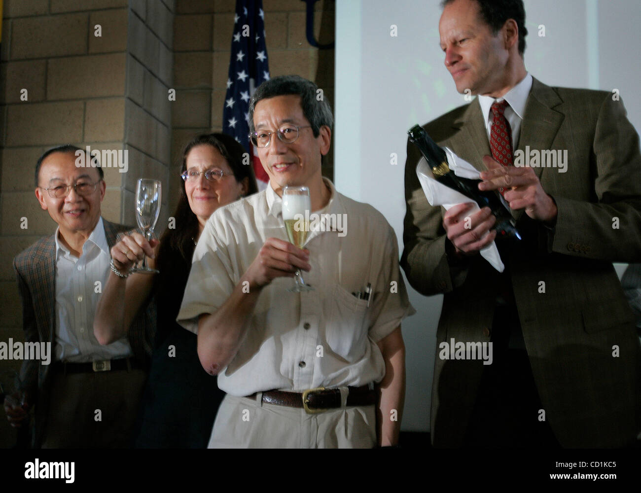 HLrogerTsienNoblePrize291097x002.jpg 10/08/2008 UCSD (San Diego, California) USA  ROGER (cq) TSIEN, second from right, a professor of pharmacology at UCSD holds his glass filled with champaign as David Brenner, M.D., right, Vice Chancellor for Health Sciences and Dean of the School of Medicine, SHU  Stock Photo