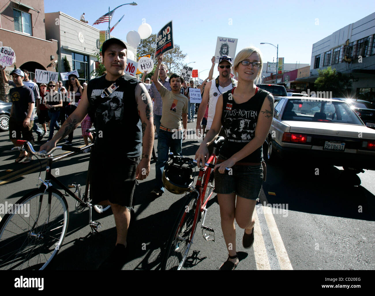 November 8, 2008 XAVIER HERNANDEZ, left, and his girlfriend ASHLEY PARKER, right, join a protest against Prop 8, which started in Hillcrest on University Avenue and finished in North Park. Thousands of people turned out to protest the recently passed Prop 8 at the Saturday afternoon San Diego rally. Stock Photo