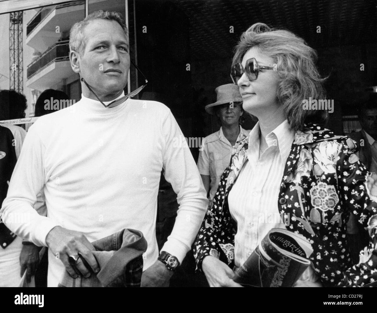 July 7, 1973 - Cannes, France - PAUL NEWMAN is as much a hero offscreen as on. A blue-eyed matinee idol whose career has successfully spanned five decades, he is also a prominent social activist, a major proponent of actors' creative rights, and a noted philanthropist. PICTURED: Newman with wife, ac Stock Photo