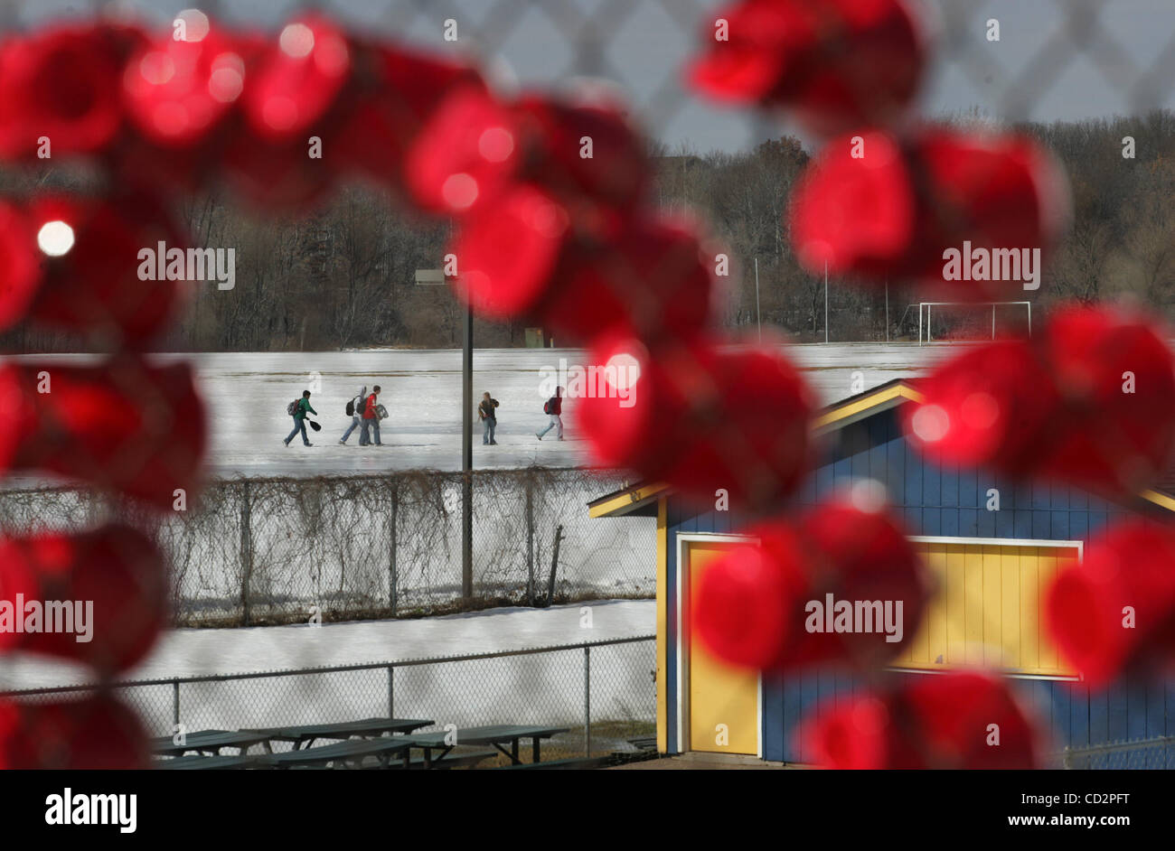 Mar 14, 2008 - Rosemount, Minnesota, USA - Rosemount High School students left school for the day on Friday. In the foreground red plastic cups were stuck into a chainlink fence to spell RIP. (Credit Image: © Jennifer Simonson/Minneapolis Star Tribune/ZUMA Press) RESTRICTIONS: * USA Tabloids Rights  Stock Photo