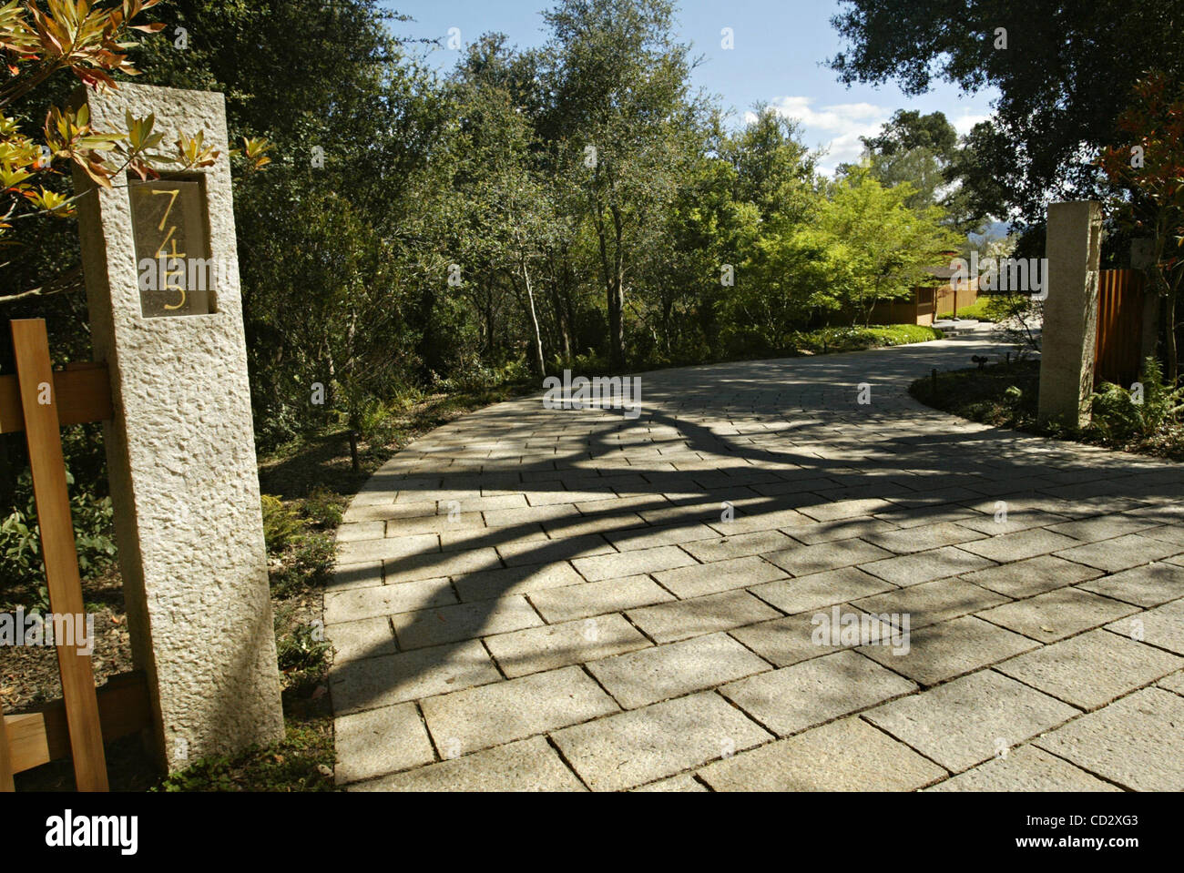 A driveway leads to the entrance of Oracle CEO Larry Ellison's estate ...