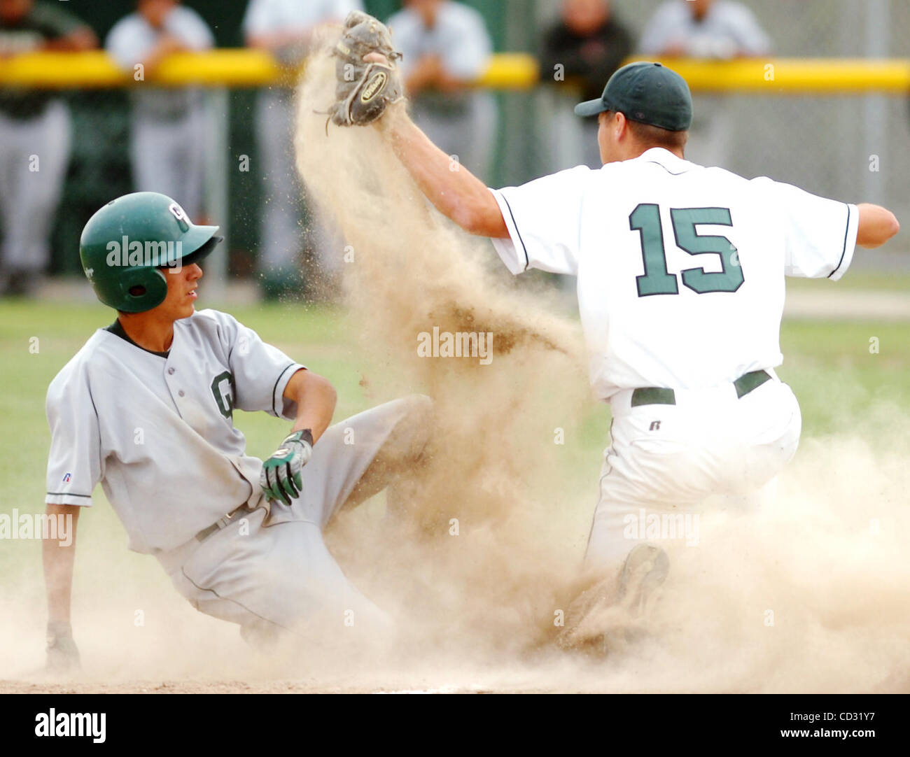 Manteca High's Tim Larson tags out Central Valley runner William Mestas at third base during a game at Manteca High on Wednesday, April 2, 2008 in Manteca, Calif.(Gina Halferty/San Joaquin Herald) Stock Photo