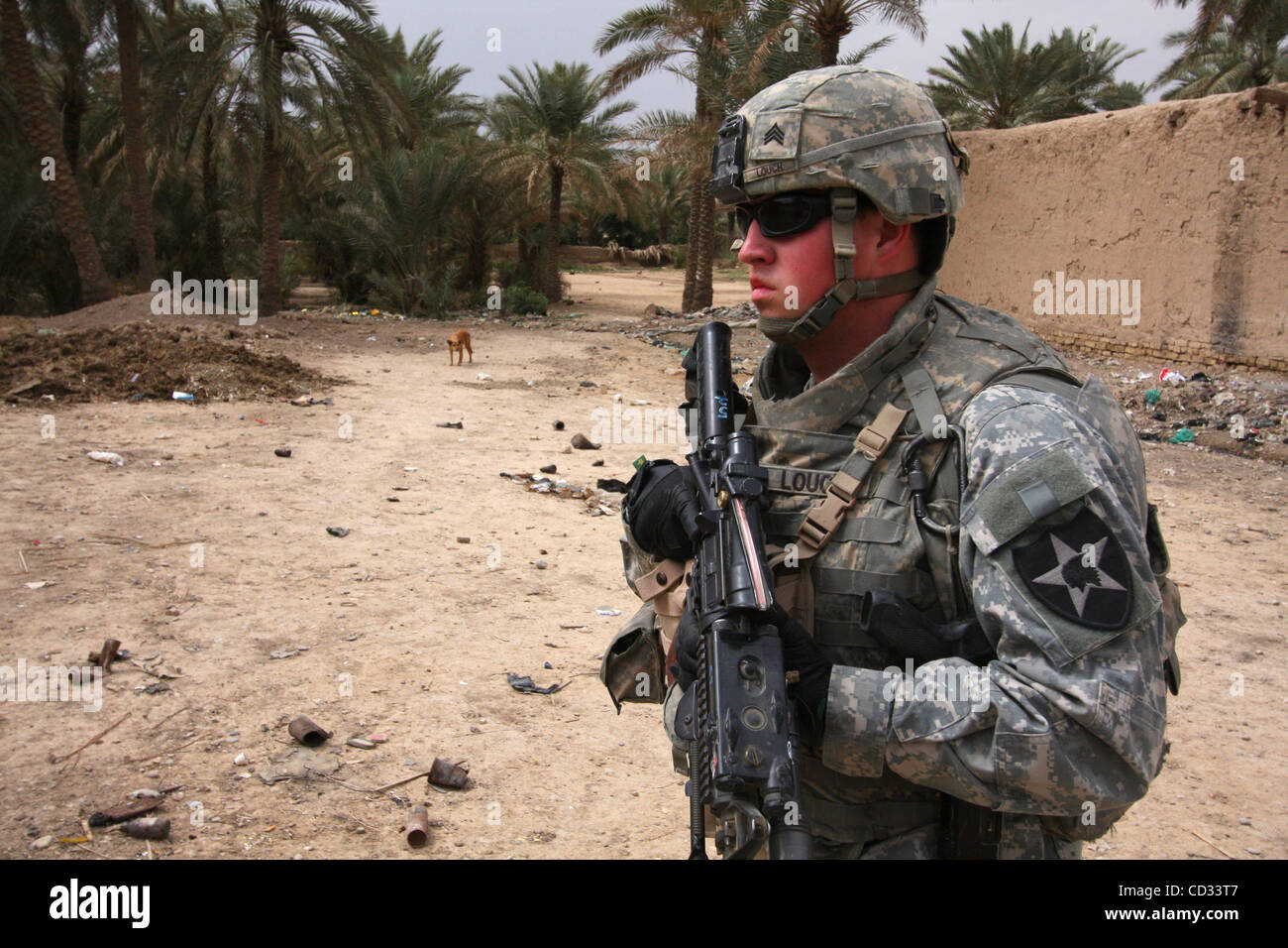 Apr 07, 2008 - Khalis, Diyala Province, Iraq - A soldier of 3rd Platoon, Cobra Troop, 2nd Squadron, 1st Cavalry Regiment as part of 4th Stryker Brigade Combat Team, 2nd Infantry Division patrols the town of Jadidah in Diyala province, Iraq. (Credit Image: © Simon Klingert/ZUMA Press) RESTRICTIONS: * Stock Photo