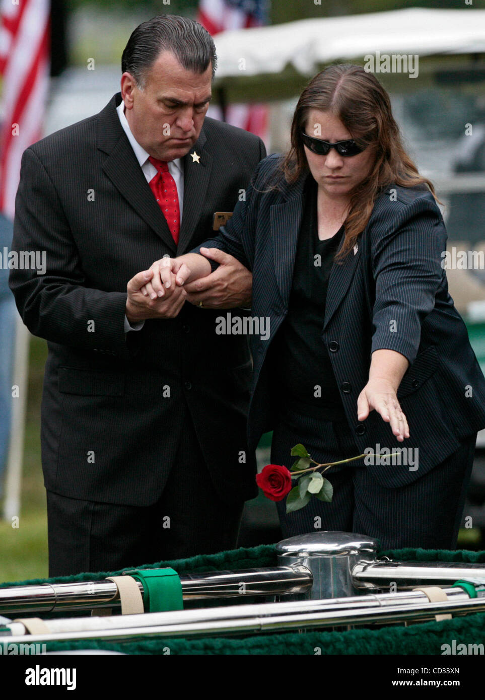 CAPTION (04/07/08, Bushnell) Leaning on Thomas Dobies, owner of Thomas