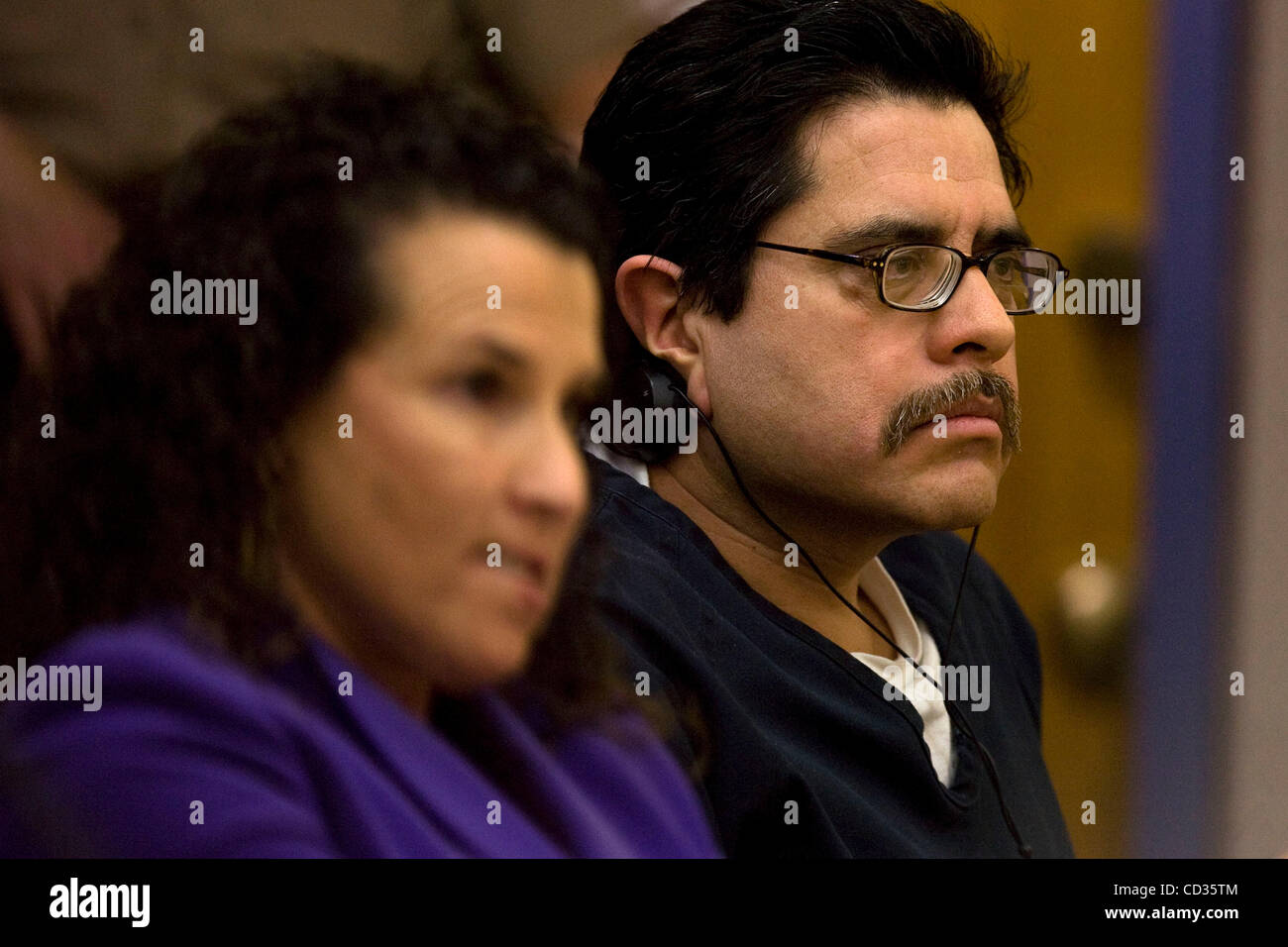 April 11, 2008 El Cajon California USA (LtoR) KIM VEGAS, attorney with the Public Defenders office of San Diego County and her client CELESTINO MENDEZ MARTINEZ listen to Judge Herbert J. Exarhos rule on the defense motion to dismiss murder charges against Celestino Mendez Martinez charged with 1988  Stock Photo