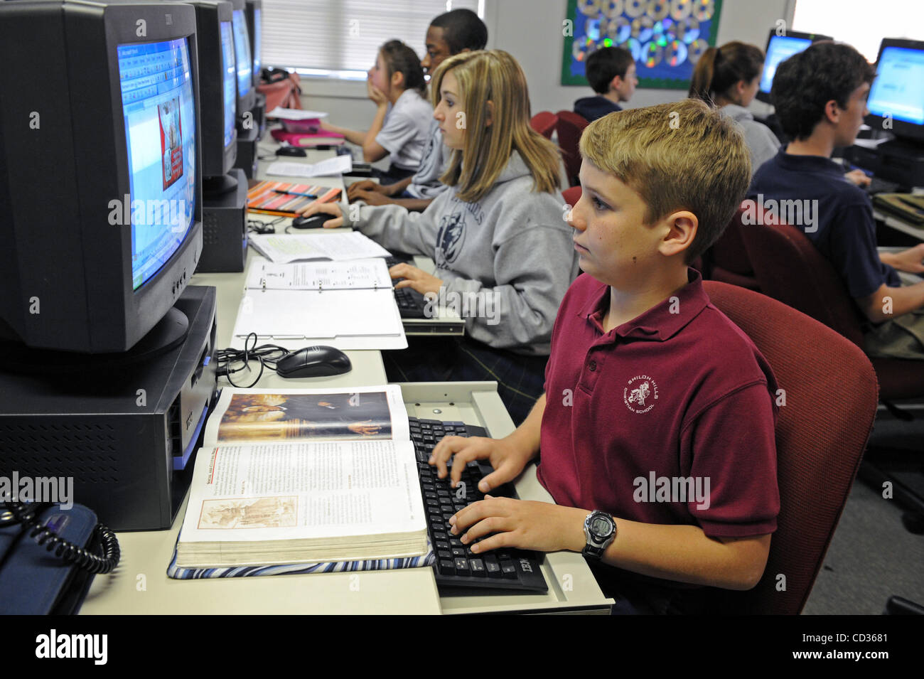 High school students at Shiloh Hills Christian School in Kennesaw GA work on computer skills in