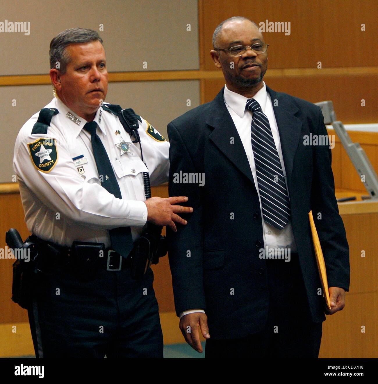 Apr 17, 2008 Largo, Florida, USA WILSON SAINTIL, 54, is led from