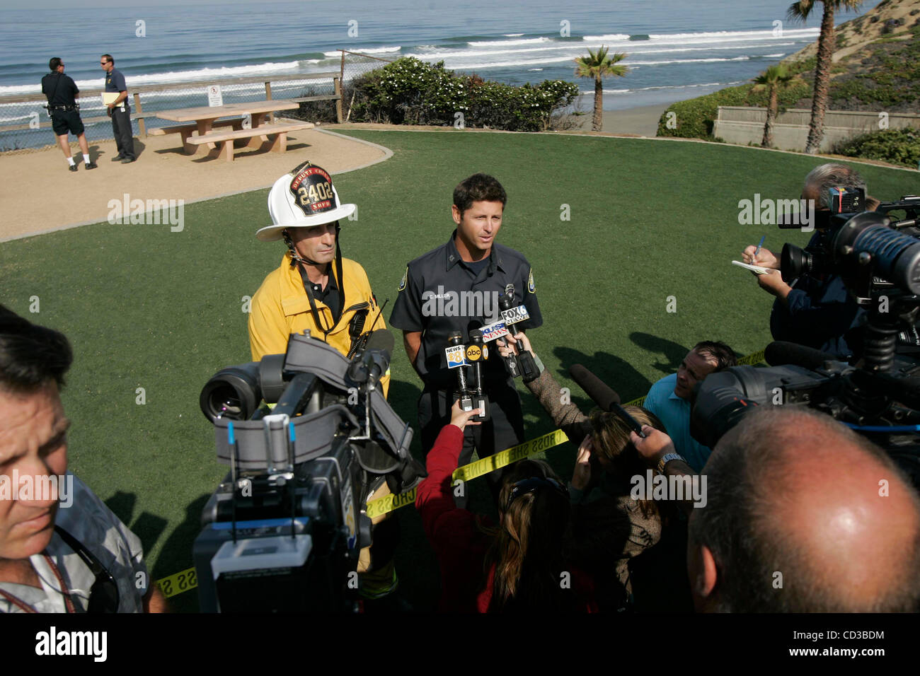 April 25th, 2008, Solana beach, California, USA.This is the scene of a shark attack at Fletcher Cove on Friday in Solana Beach, California. The woman in the photos was identified as the daughter off the deceased victim. The press coference is Deputy Fire Chief Dismas Abelmman, Solana Beach FD,(left) Stock Photo