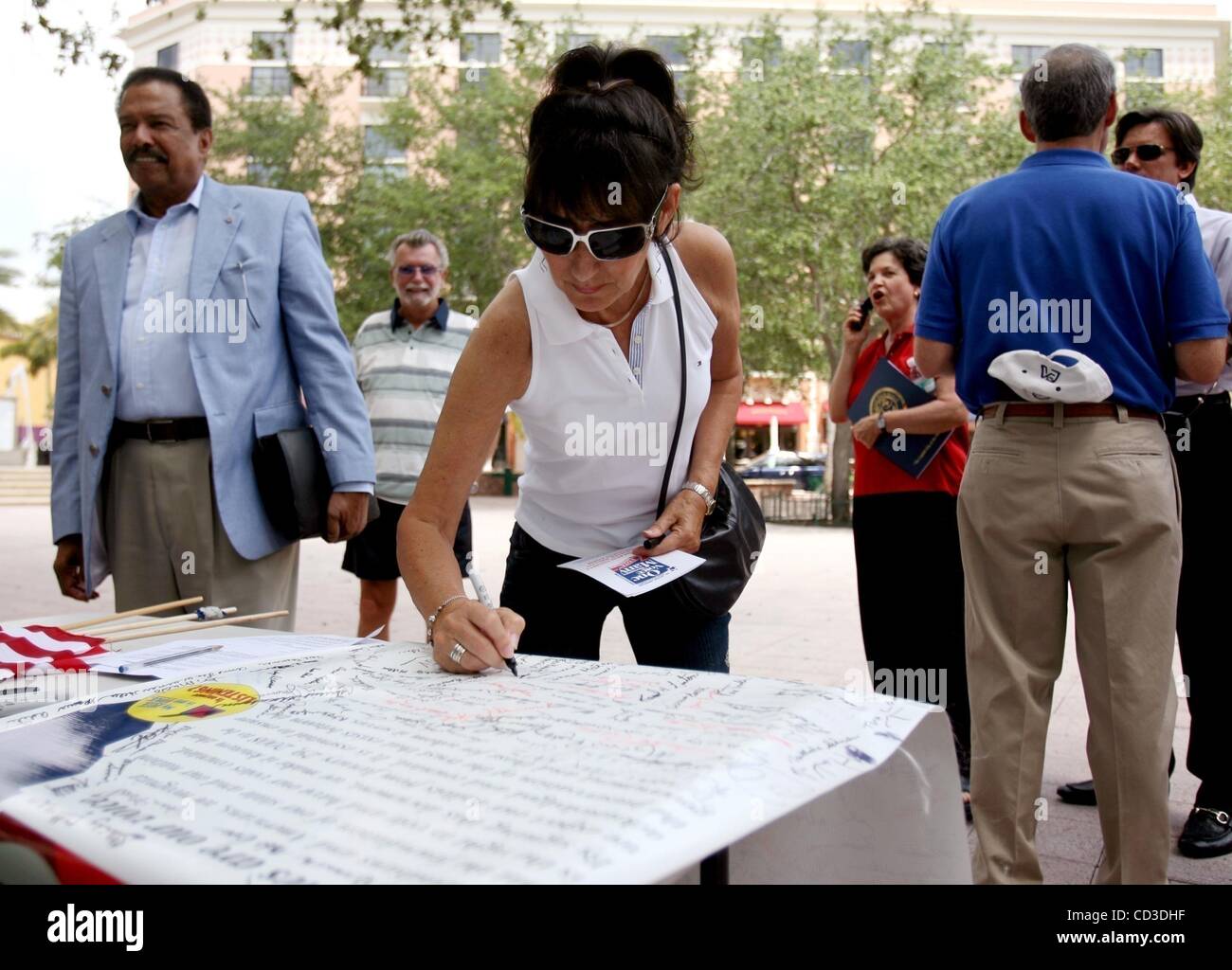 Apr 26, 2008 - Stuart, Florida, USA - SANDRA GEC, of Boynton Beach, signs a petition asking the Democratic National Committee to count Florida votes from the primary held in January at a Florida Demands Representation rally at the public library in West Palm Beach Saturday.  (Credit Image: Â© Gary C Stock Photo