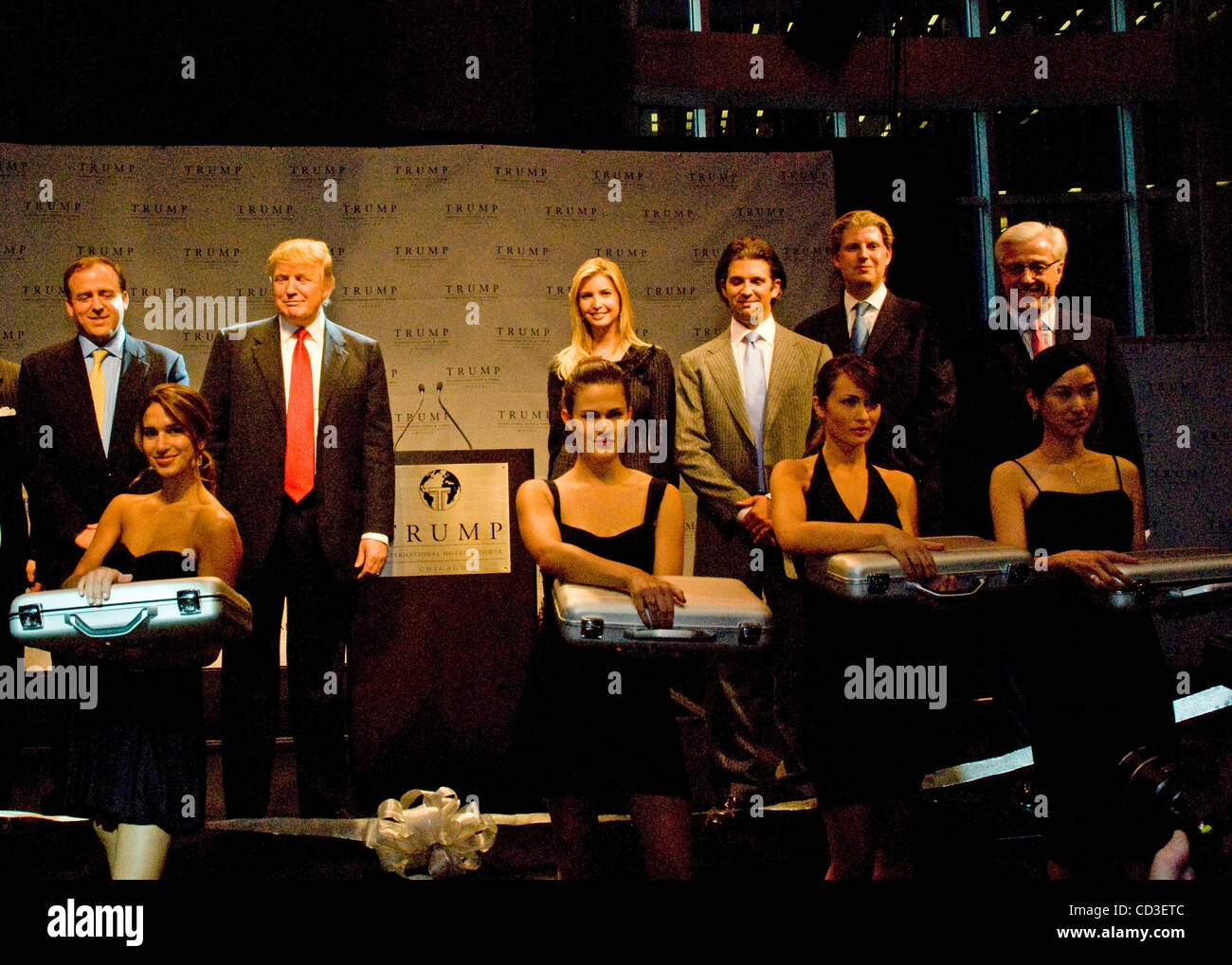 A la "Deal or No Deal," models open their briefcases to reveal the