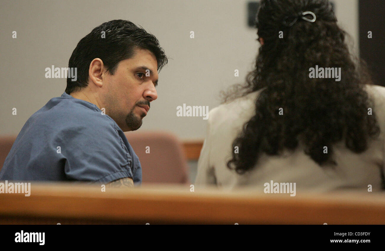 042908 tc met art.....0052315A.....Photo by David Spencer/The Palm Beach Post.....Ft. Pierce....At the St. Lucie County courthouse tuesday, Jeffrey Rodriguez, left, confers with asst. public defender Christina Ledina after he received a sentence of 10 years from Judge Larry Schack.  Rodriguez stole  Stock Photo