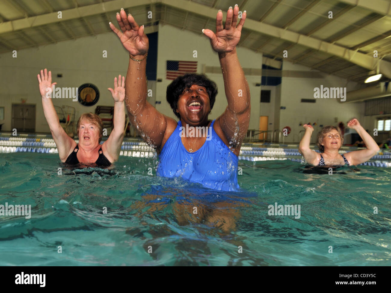 Kennesaw, GA Women of various ages in water aerobics exercise class