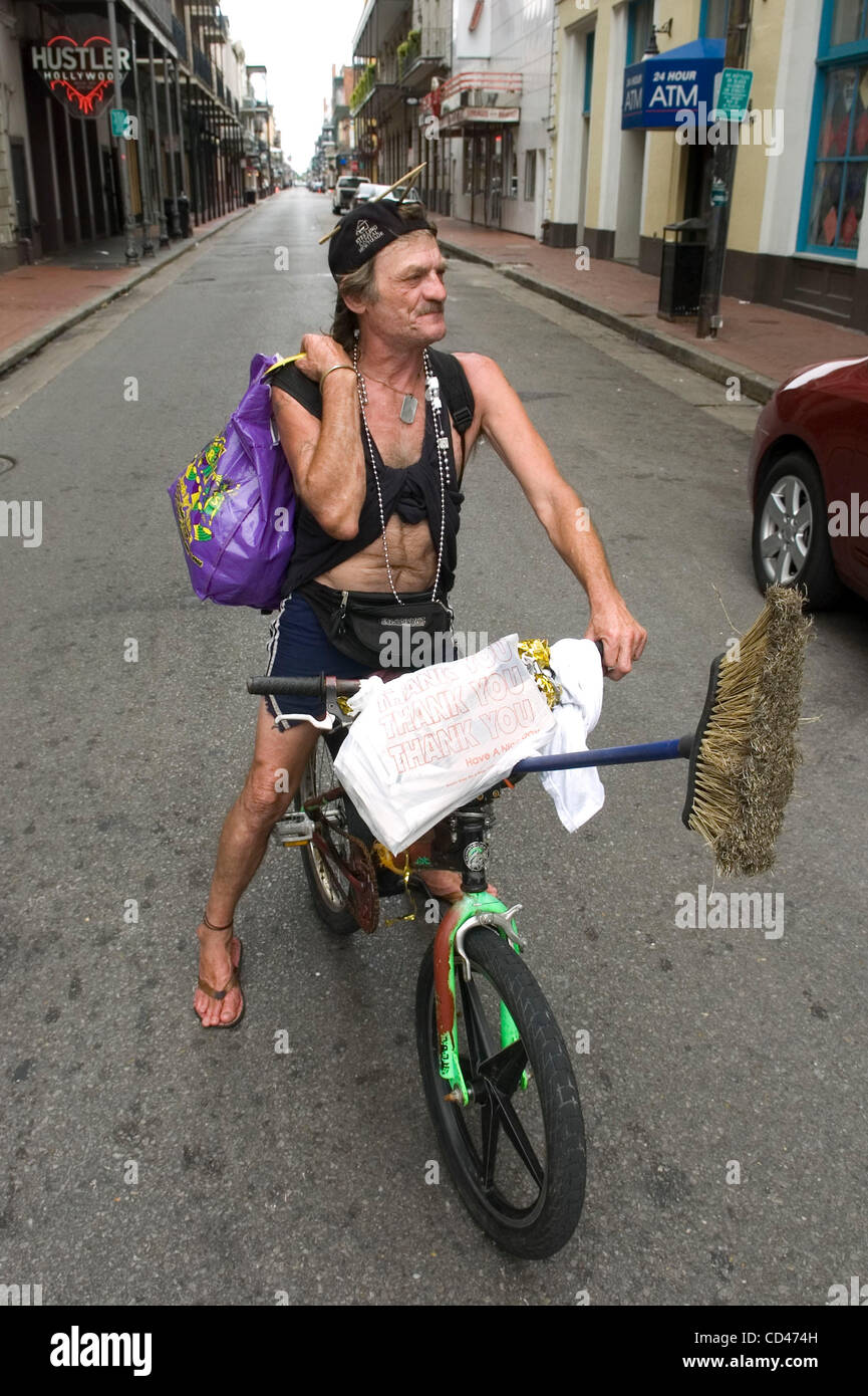 New Orleans resident Willie Dean, 53, rides his bike on a deserted Bourbon Street in the French Quarter as approaching Hurricane Gustav nears New Orleans, Louisiana, USA on 31 August 2008. New Orleans Mayor  Ray Nagin announced a dusk to dawn curfew in the city beginning tonight. Stock Photo