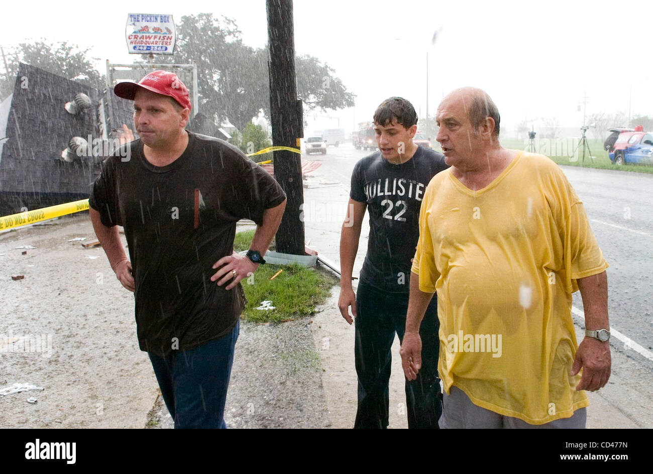 Tate Lefort Sr. (L), his son Tate Jr. (C) and his father Logan react