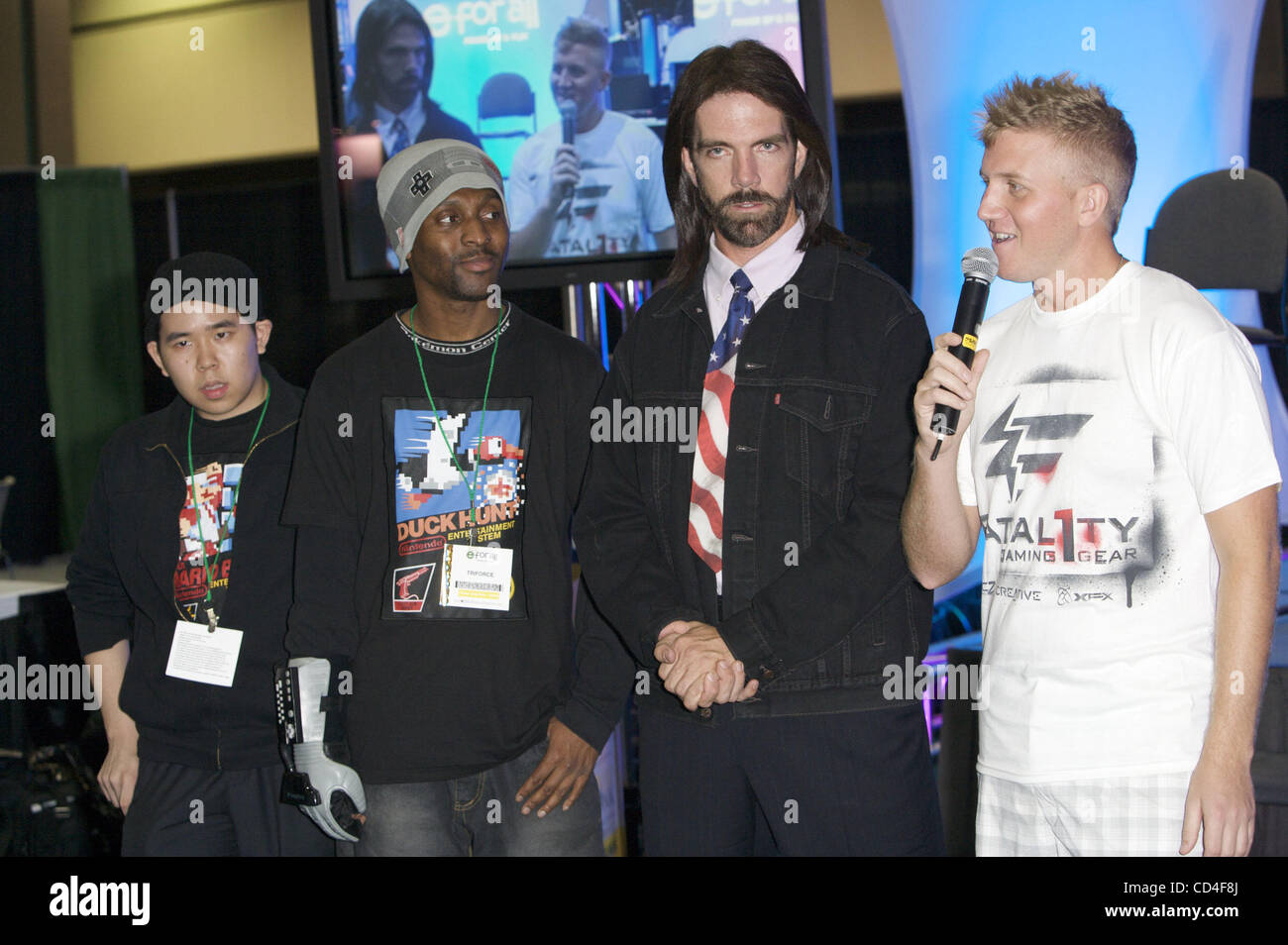 Group shot of the top gamers in the world at the 'E for All' Gamer Expo held at the Los Angeles Convention Center.  Justin Wong (left) , known as the King of Fighters, holds the 6 time Marvel vs Capcom2 World Championship Title.  Triforce (2nd from left) holds 30 plus world record in gaming, and is  Stock Photo