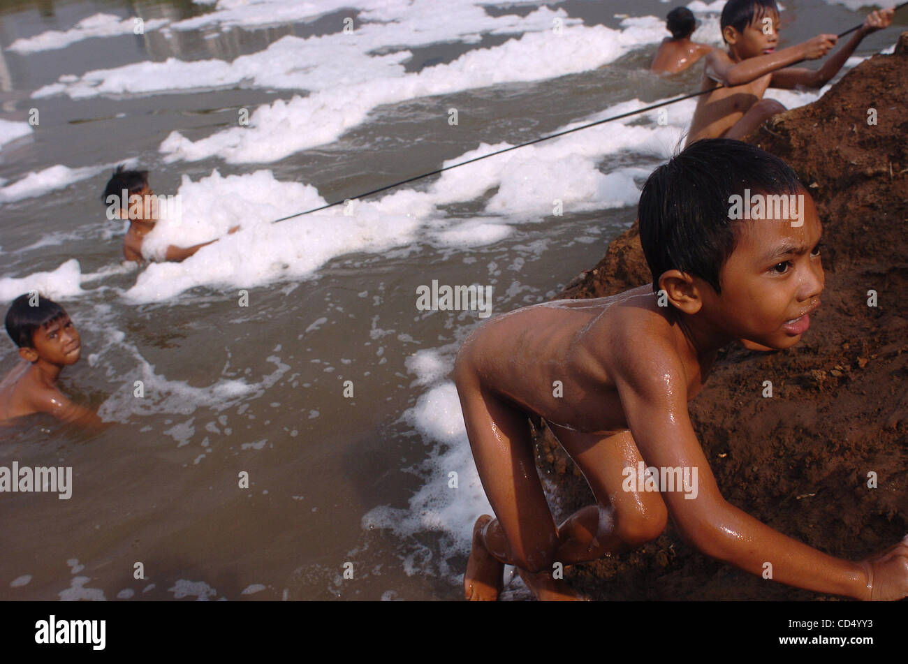 Indonisaian  boy river swim alamy Boys swim in polluted river at slum area in Jakarta ...