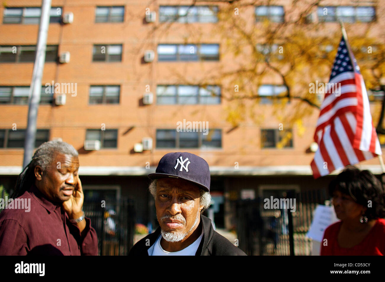 A poll worker in South Chicago waits outside for voters on election day. of people for the historic event.. Stock Photo
