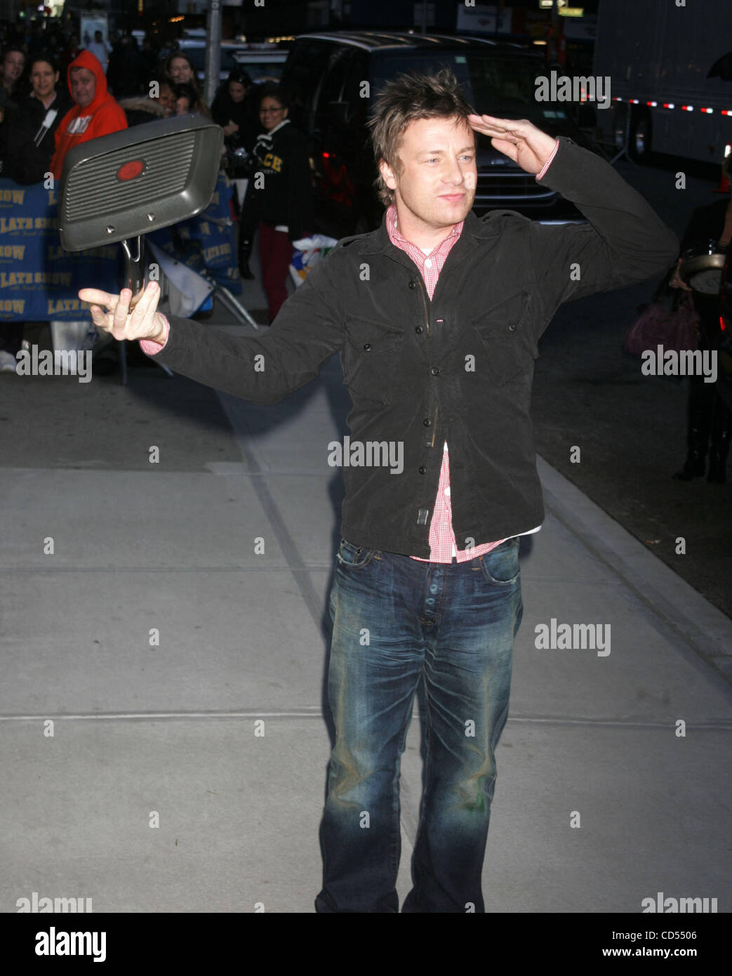 Nov 10, 2008 - New York, NY, USA - Chef JAMIE OLIVER twirls a frying pan at his appearance on 'The Late Show With David Letterman' held at the Ed Sullivan Theater.  (Credit Image: ZUMApress.com) Stock Photo