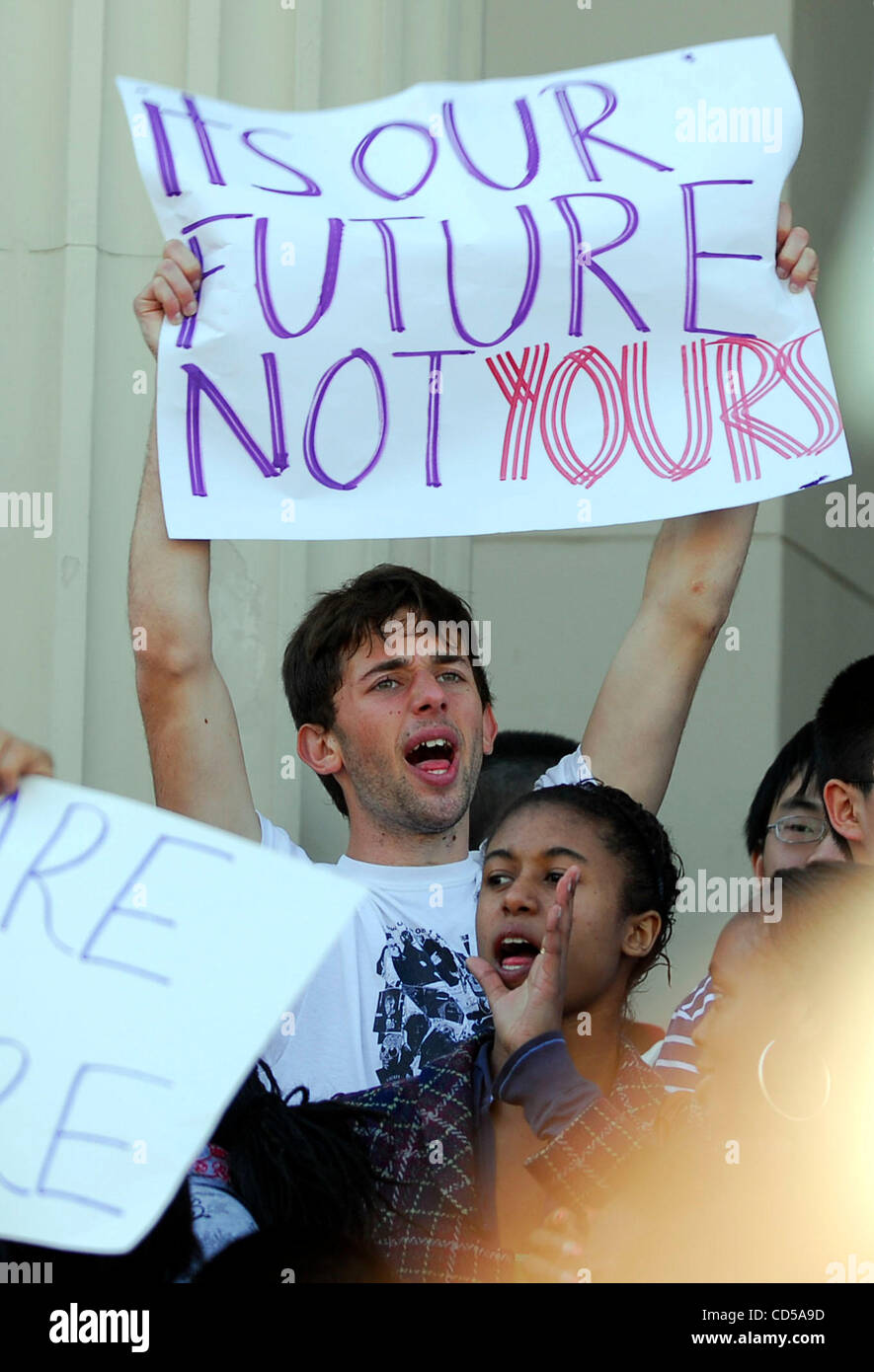 Students protest proposed cuts in athletics and music progams in