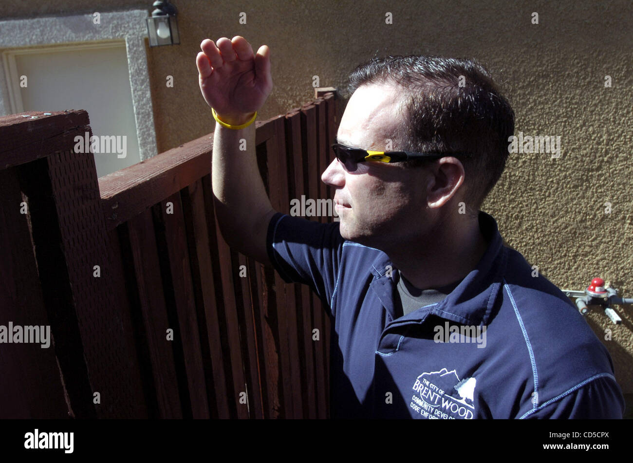 At six feet tall, Brentwood Code Enforcement officer Ken Rader can