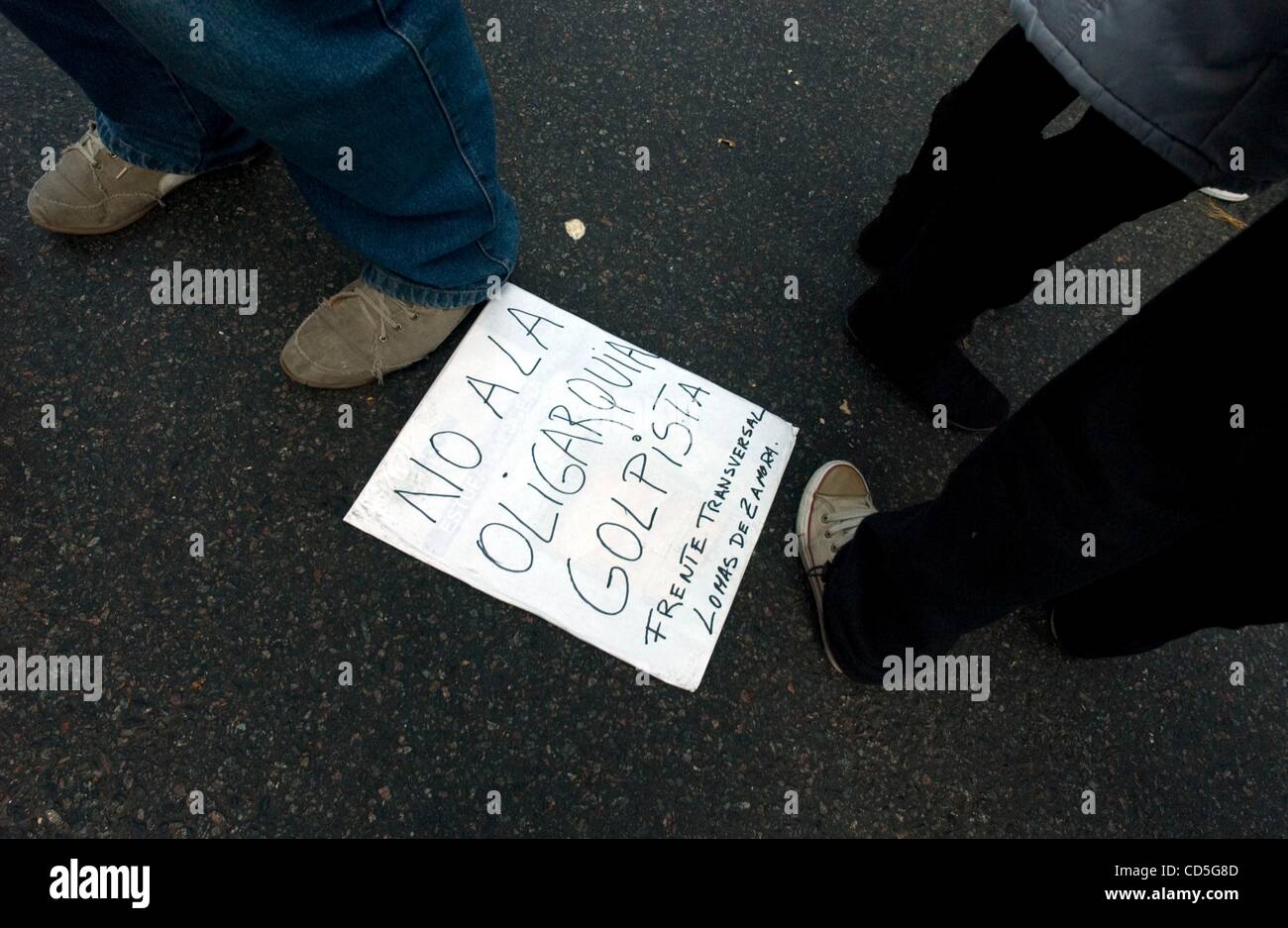 Jun 18, 2008 - Buenos Aires, Argentina - A pro-government sign, which reads, 'no to the oligarchy coup,' in reference to the large agricultural groups embroiled in a conflict with the national government, are discarded among the crowd as pro-government supporters flood the Plaza de Mayo during a ral Stock Photo