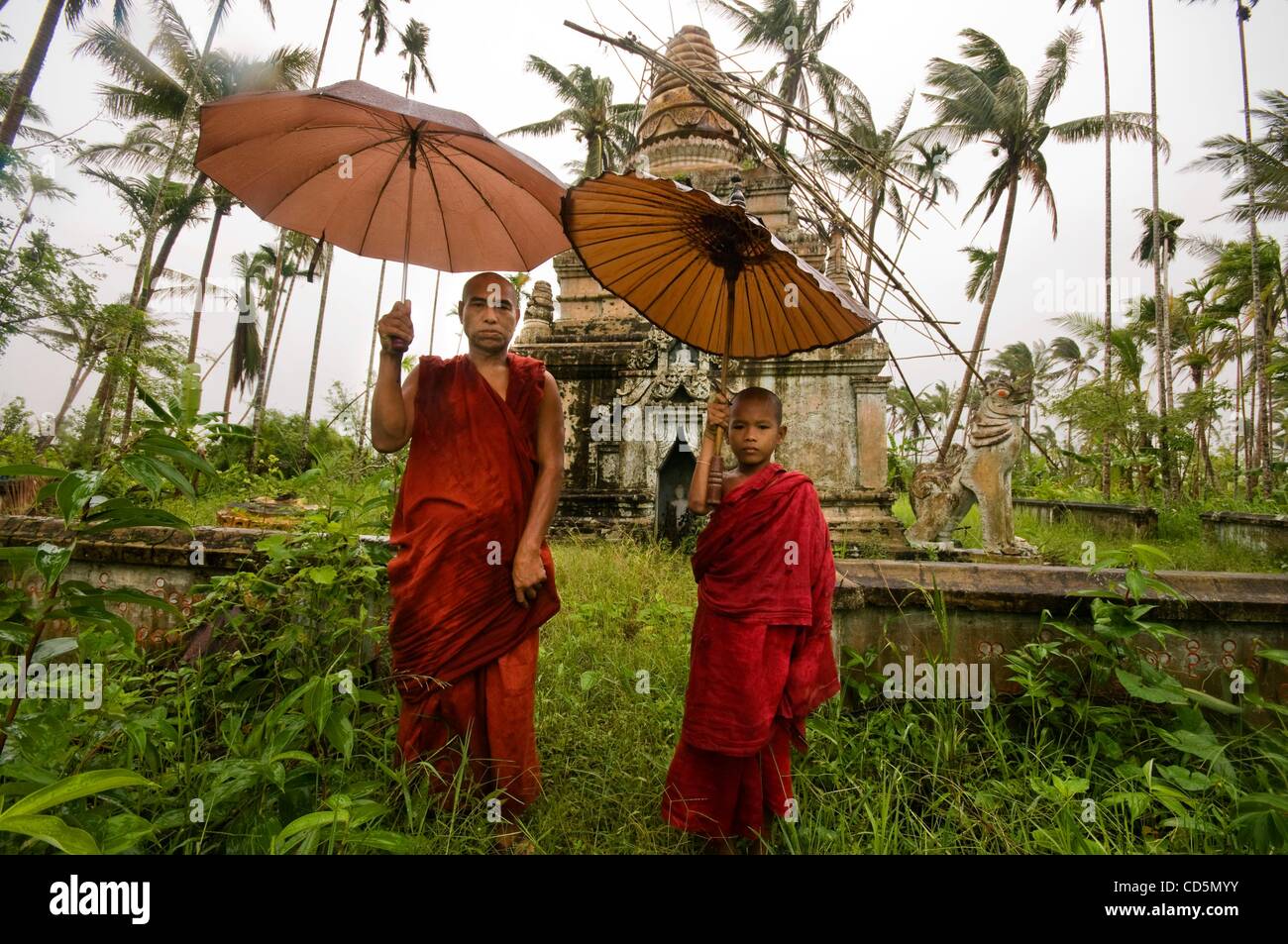 Aug 26, 2008 - Aung Hlaing Village, Burma - For a region that four months ago lent a stage to one of the worst humanitarian disasters in recent memory, the waterlogged highway descending into Burma's Irrawaddy Delta reveals little of what it saw. Cyclone Nargis made landfall not far from here on the Stock Photo