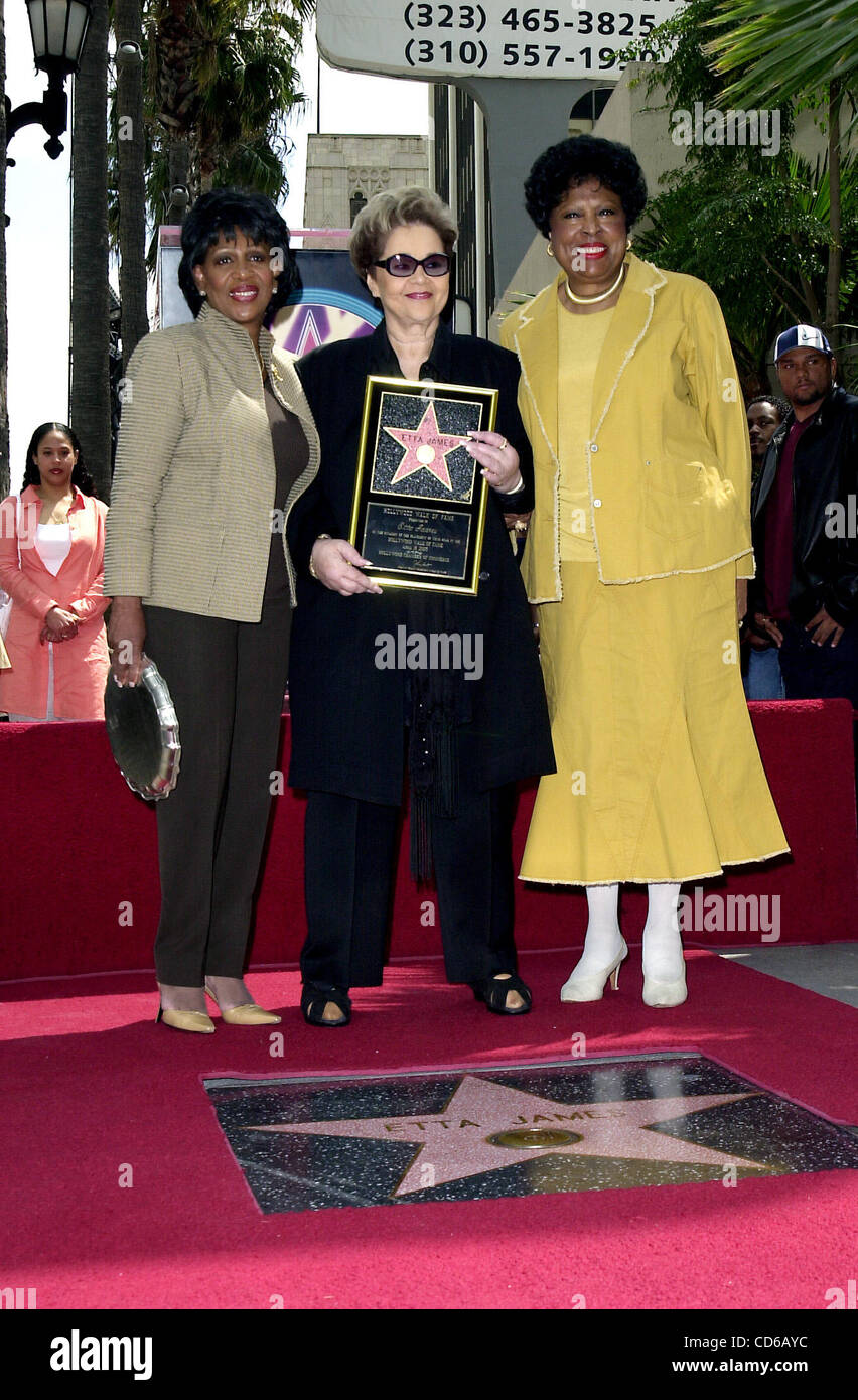 Apr. 18, 2003 - Hollywood, California, U.S. - K47022MG.LOS ANGELES, April 18 2003 (SSI) - -.Flanked by congresswomen Maxine Waters and Diane Watson, legendary singer Etta James poses with a token of appreciation, during ceremony honoring James with with the 2,223nd Star on the Hollywood Walk of Fame Stock Photo