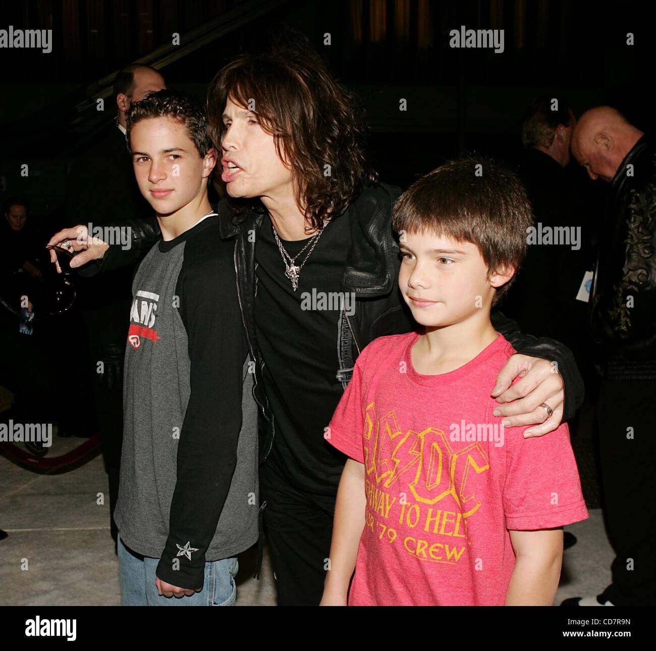 Image of STEVEN TYLER OF AEROSMITH HOLDS SON DURING MTVICON EVENT,  2002-04-15