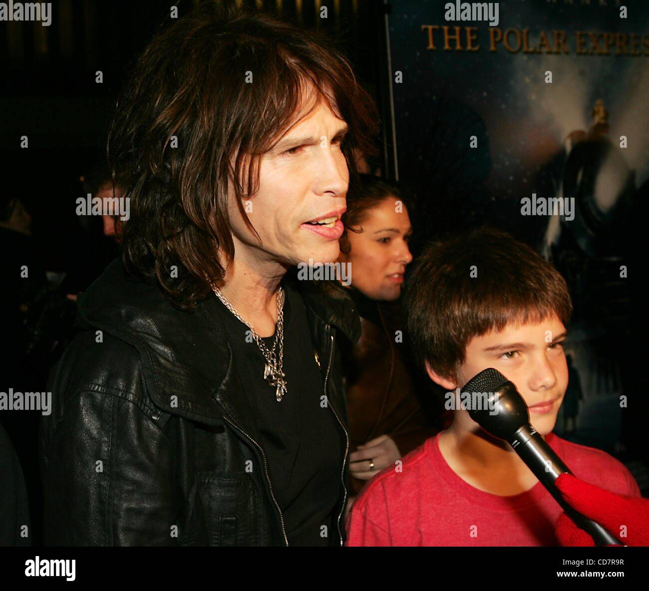 Singer Steven Tyler and his son Taj Tyler arrive for the premiere of