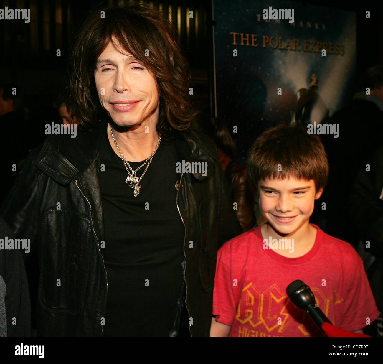 Singer Steven Tyler and his son Taj Tyler arrive for the premiere of