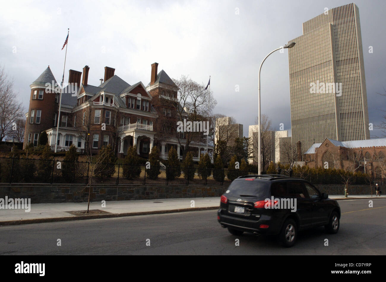 A New York State office building (R) rises over the Executive Mansion, residence of the Governors of New York State, located on Eagle Street in downtown Albany. Stock Photo