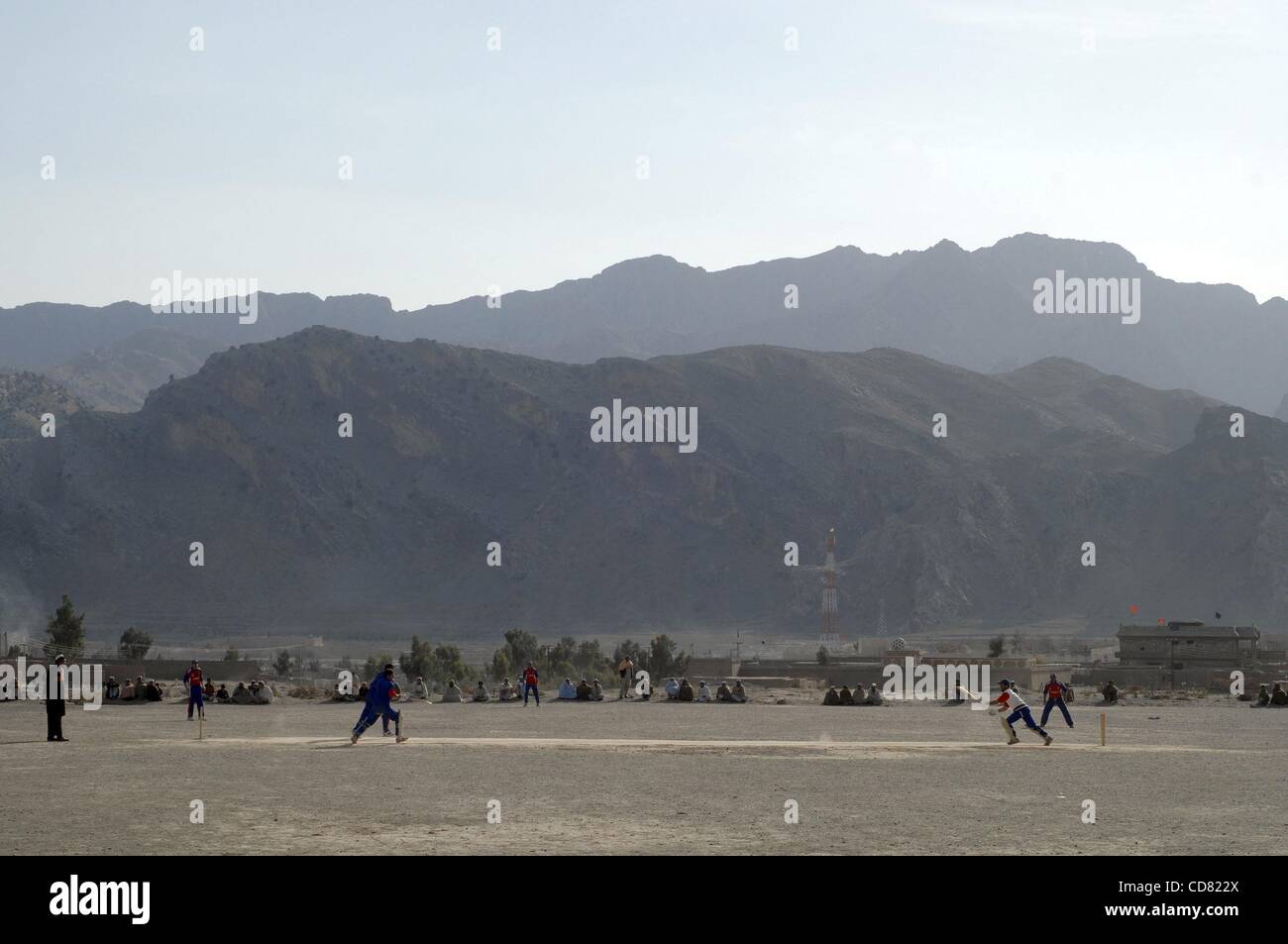 Apr 03, 2008 - Tribal Area, PAKISTAN -  Pashtuns play cricket in the federally administered tribal areas of Pakistan, less than 50 kilometers from the Afghan border. The region's residents are known to hide Taliban and Al Qaeda militants in the mountainous autonomous area.  PICTURED: February 24, 20 Stock Photo