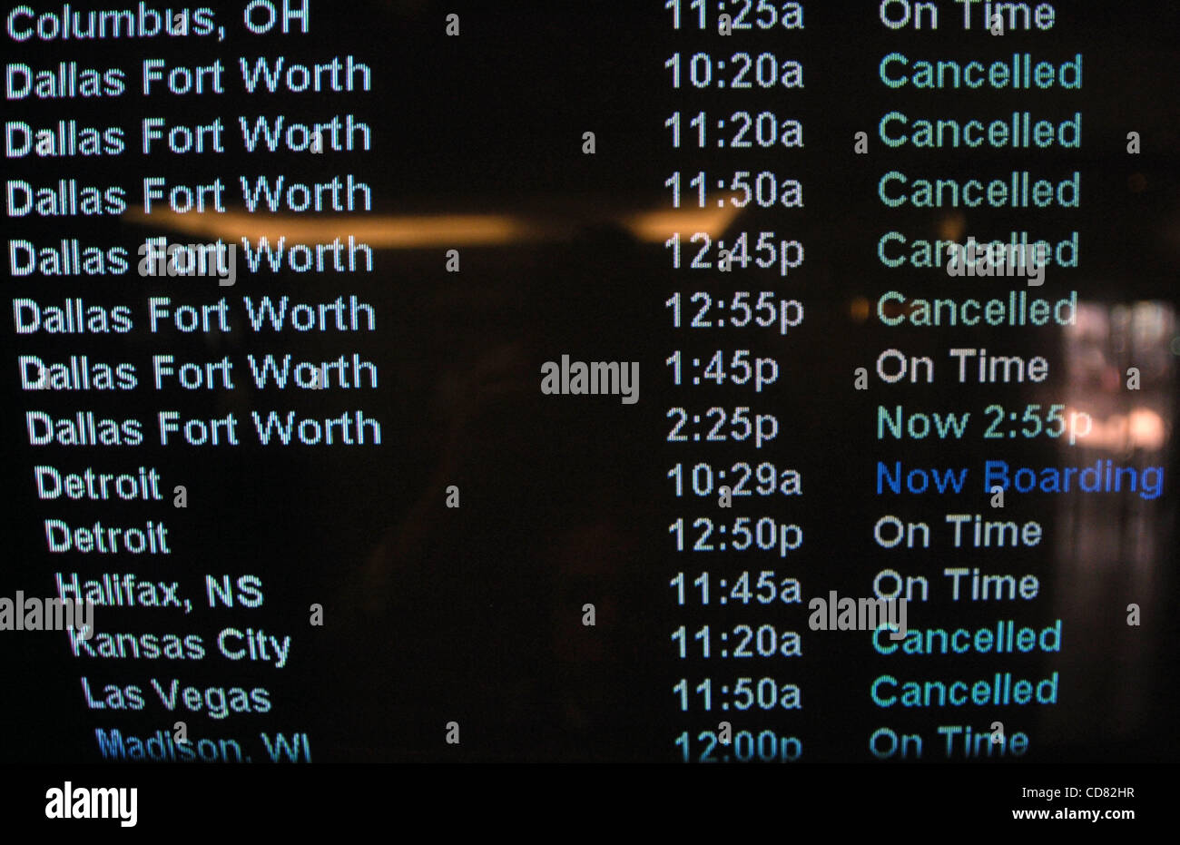 An American Airlines departures board lists some of the flights as