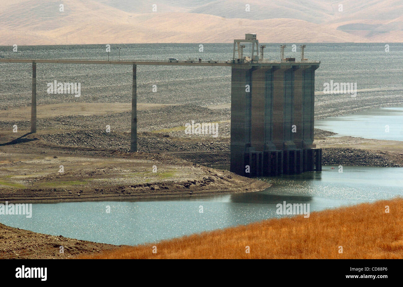 Intake structures sit above the low water level in San Luis Reservoir