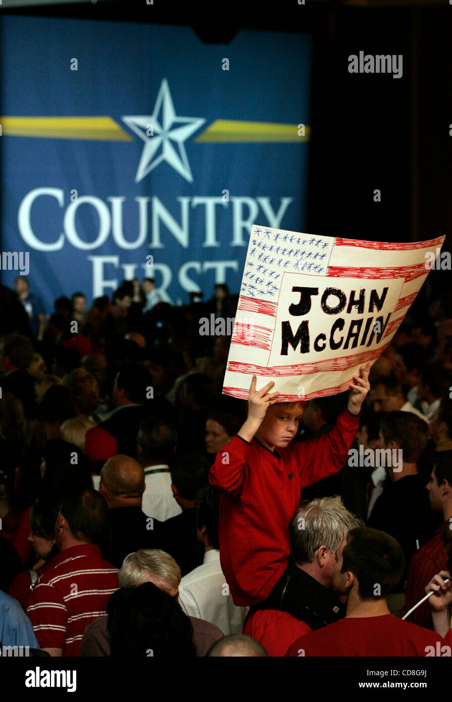 Nov 04, 2008 - Phoenix, Arizona, USA - A young and disappointed supporter of John McCain holds a sign on election night festivities at McCain headquarters on the grounds of the Biltmore Hotel in Phoenix on election day for the 2008 Presidential election. (Credit Image: © Jonathan Alcorn/ZUMA Press) Stock Photo