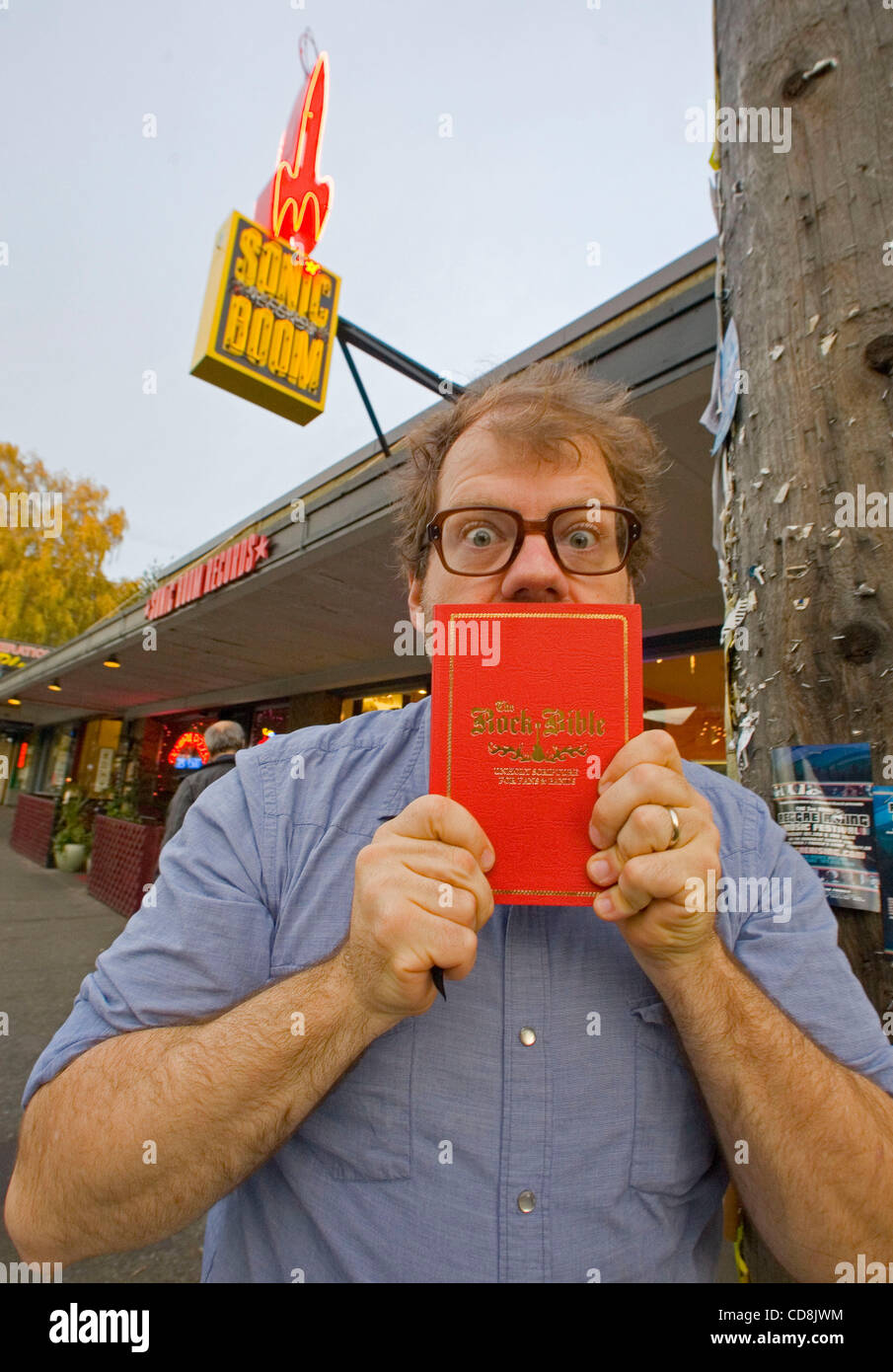 Grammy-winning producer and Chunklet publisher Henry Owings on tour with his new book 'The Rock Bible' at Sonic Boom records in Seattle,WA.  Penned by a compendium of rock and roll’s most irreverent comedic minds—chiefly Owings, Patton Oswalt, and Polyphonic Spree drummer Brian Teasley—The Rock Bibl Stock Photo