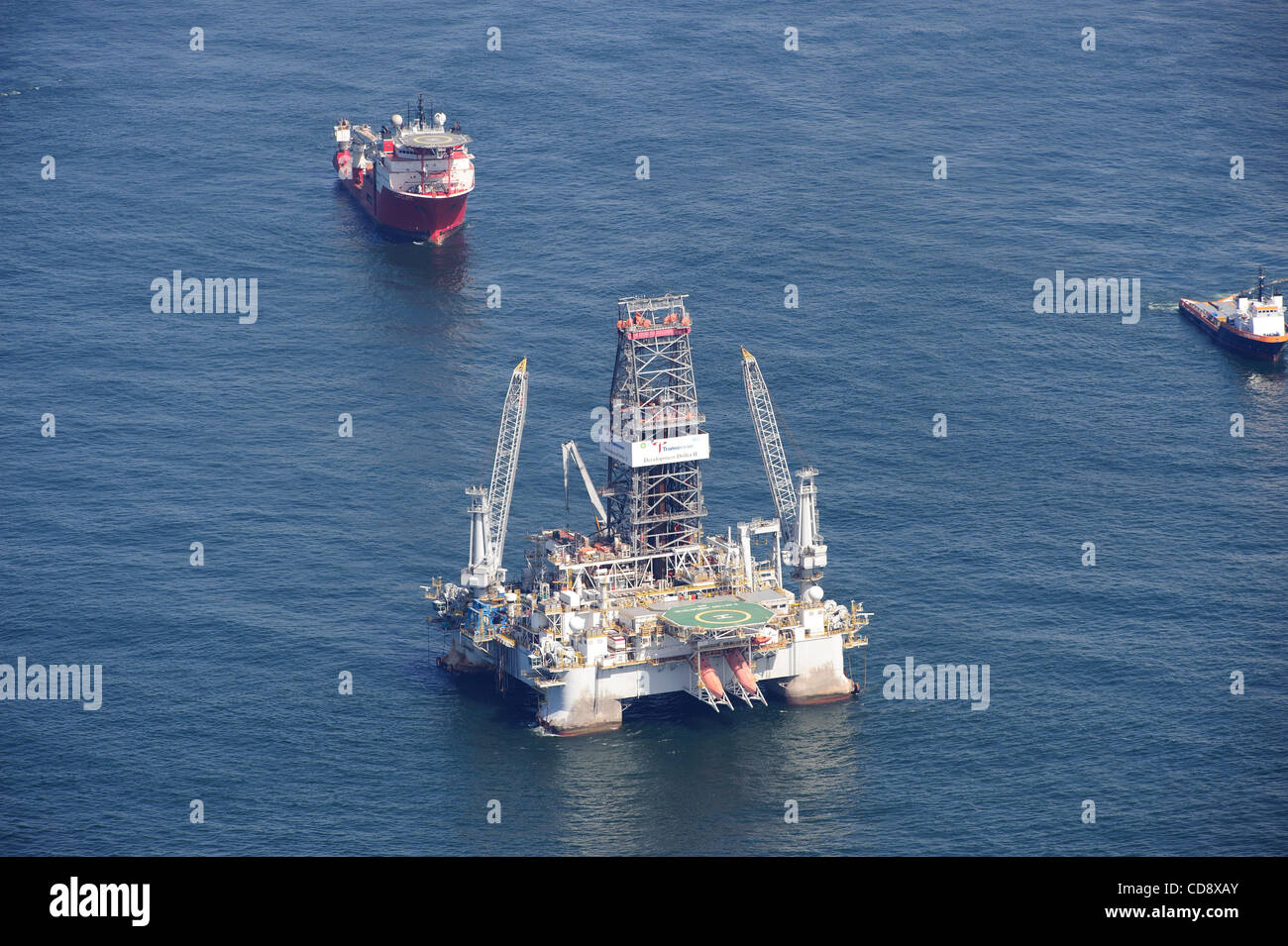 Development driller 2 and support boats at the site of the deepwater horizon oil spill site. The oil leak was capped on july 15th , but the  relief wells continue to permanently seal the busted well. Stock Photo