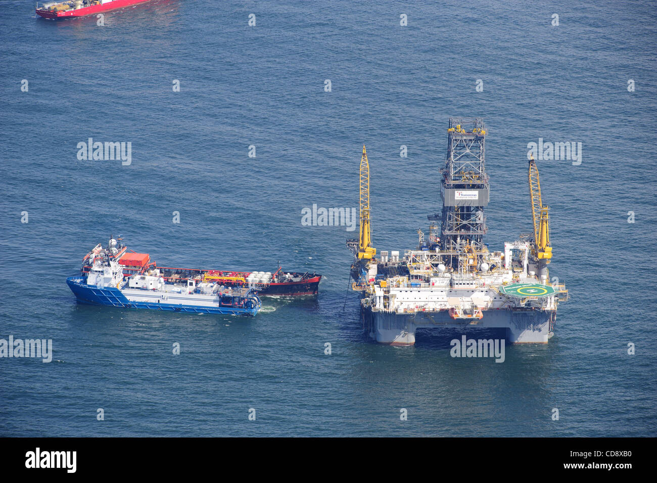 Development driller 3 and support boats at the site of the deepwater horizon oil spill site. The oil leak was capped on july 15th , but the  relief wells continue to permanently seal the busted well. Stock Photo