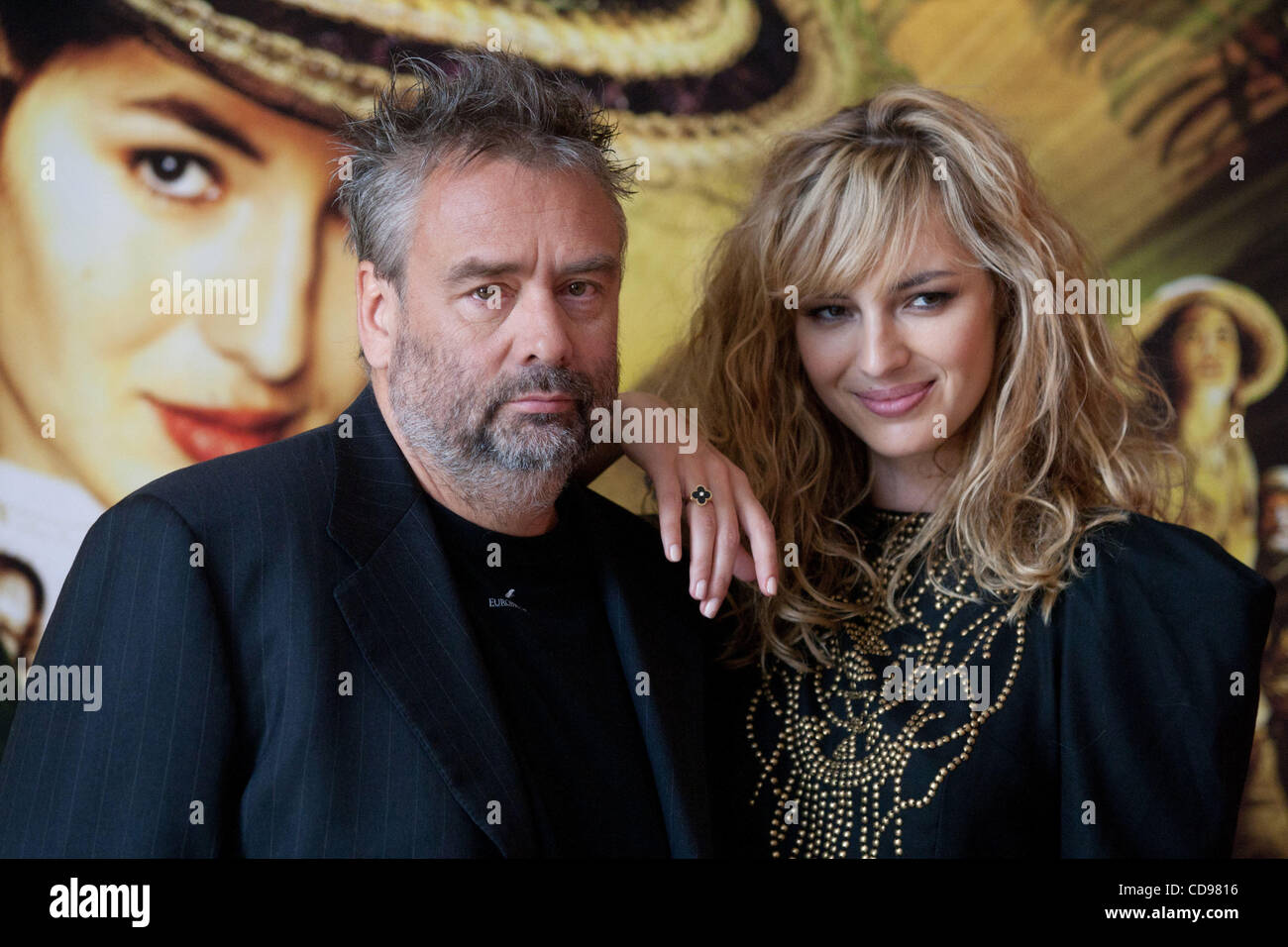 Pictured: French film director Luc Besson and french actress Louise Bourgoin (r) at the press release of Besson`s Les Aventures extraordinaires d`Ad&#232;le Blanc film at the International Moscow Film Festival. Stock Photo