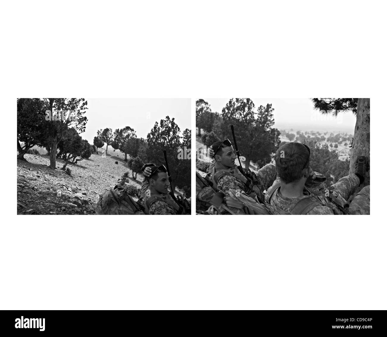 Jul 01, 2010 - Paktika, Afghanistan - U.S. Soldiers from Abu Company, 1st Battalion, 187th Infantry Regiment, sit on a hill top near the Afghan-Pakistan border. (Credit Image: © Bill Putnam/ZUMAPRESS.com) Stock Photo