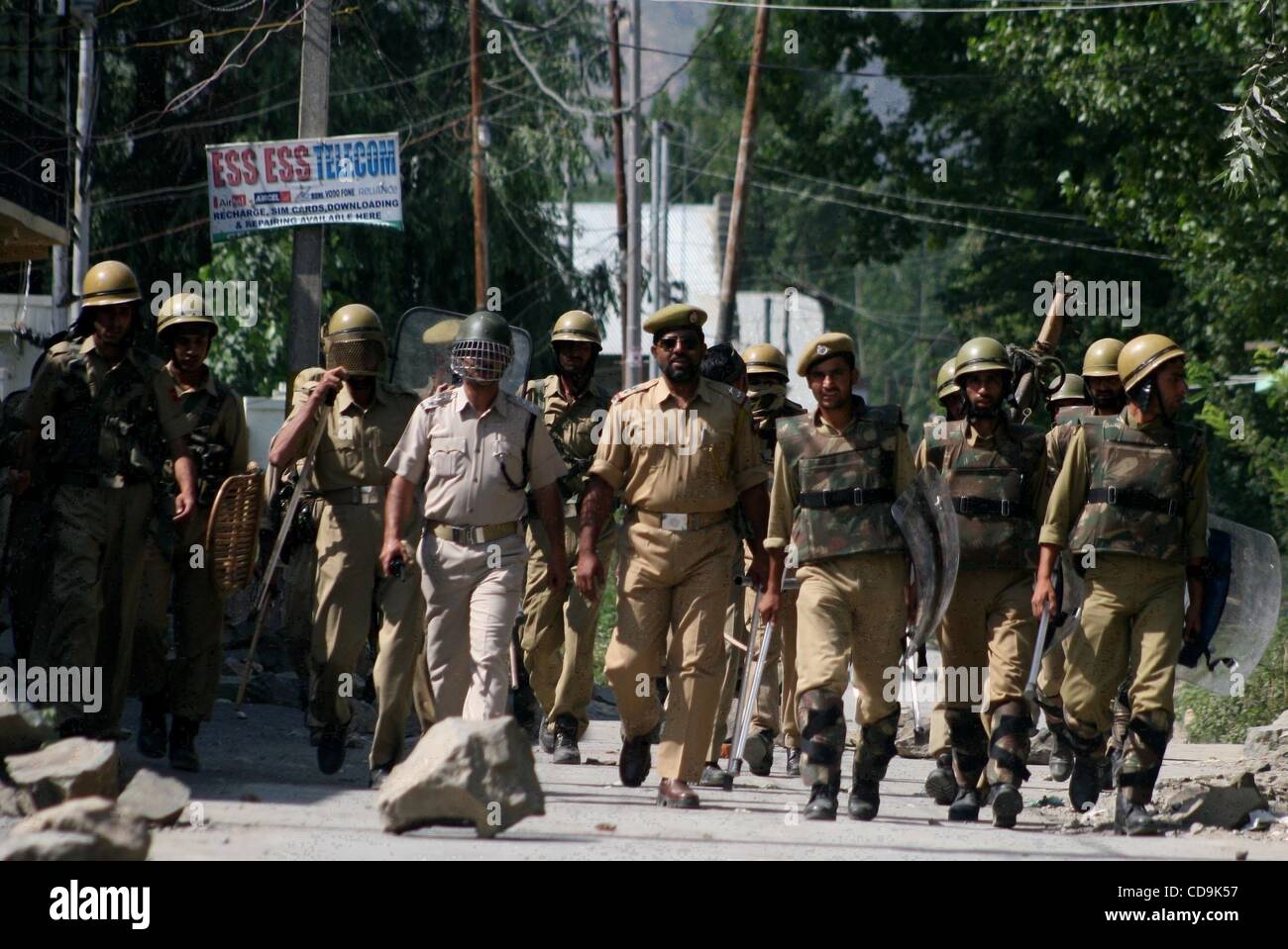 Jul 15, 2010 - Kashmir, Srinagar, India - Indian police petroling during a protest in Srinagar, the summer capital of Indian Kashmir. Kashmir has been rocked by protests and strikes for nearly a month. At least 15 people have died mostly in shootings blamed on police and indian paramilitary soldiers Stock Photo